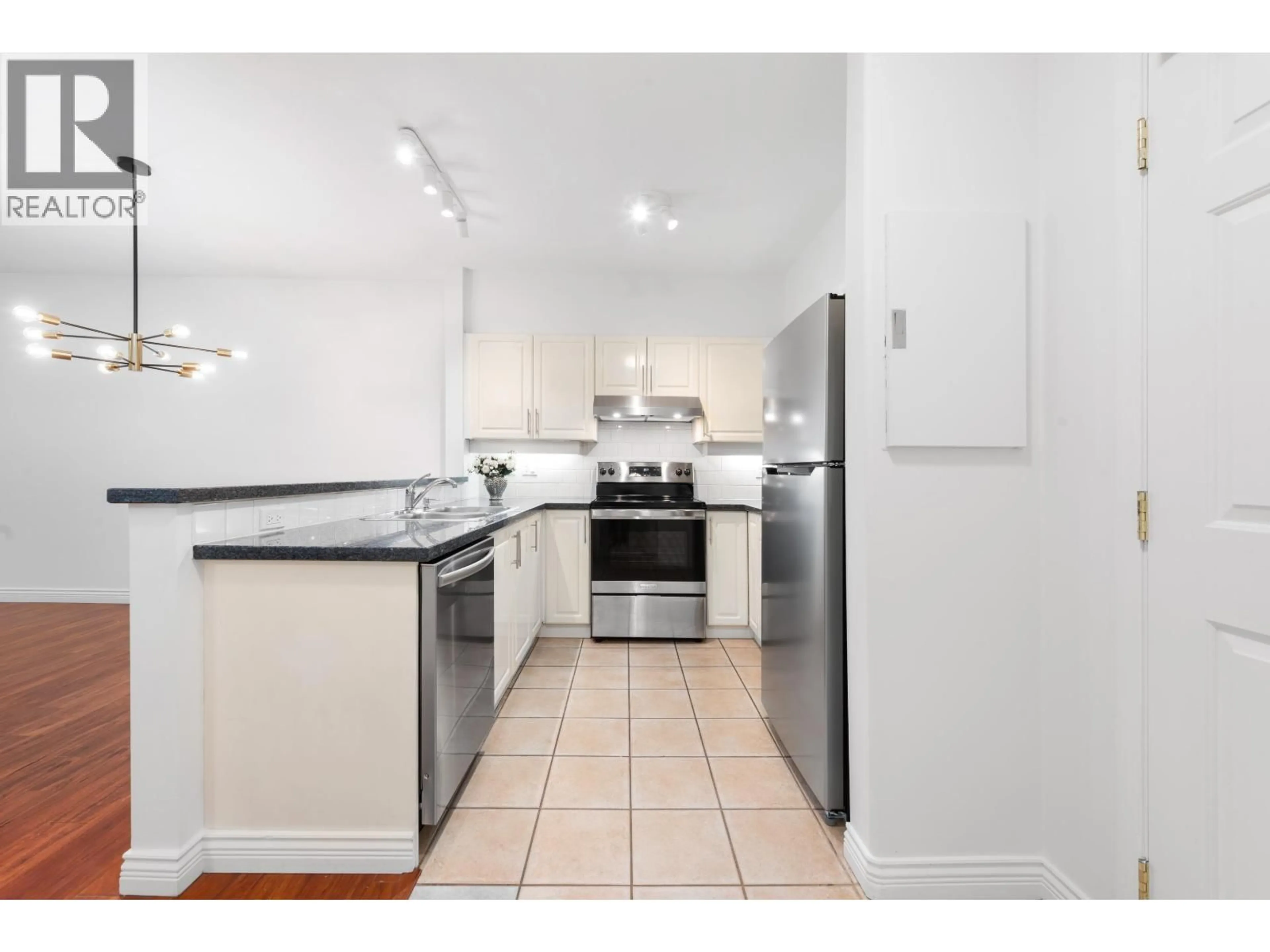 Standard kitchen, ceramic/tile floor for 217 - 3629 DEERCREST DRIVE, North Vancouver British Columbia V7G2S9
