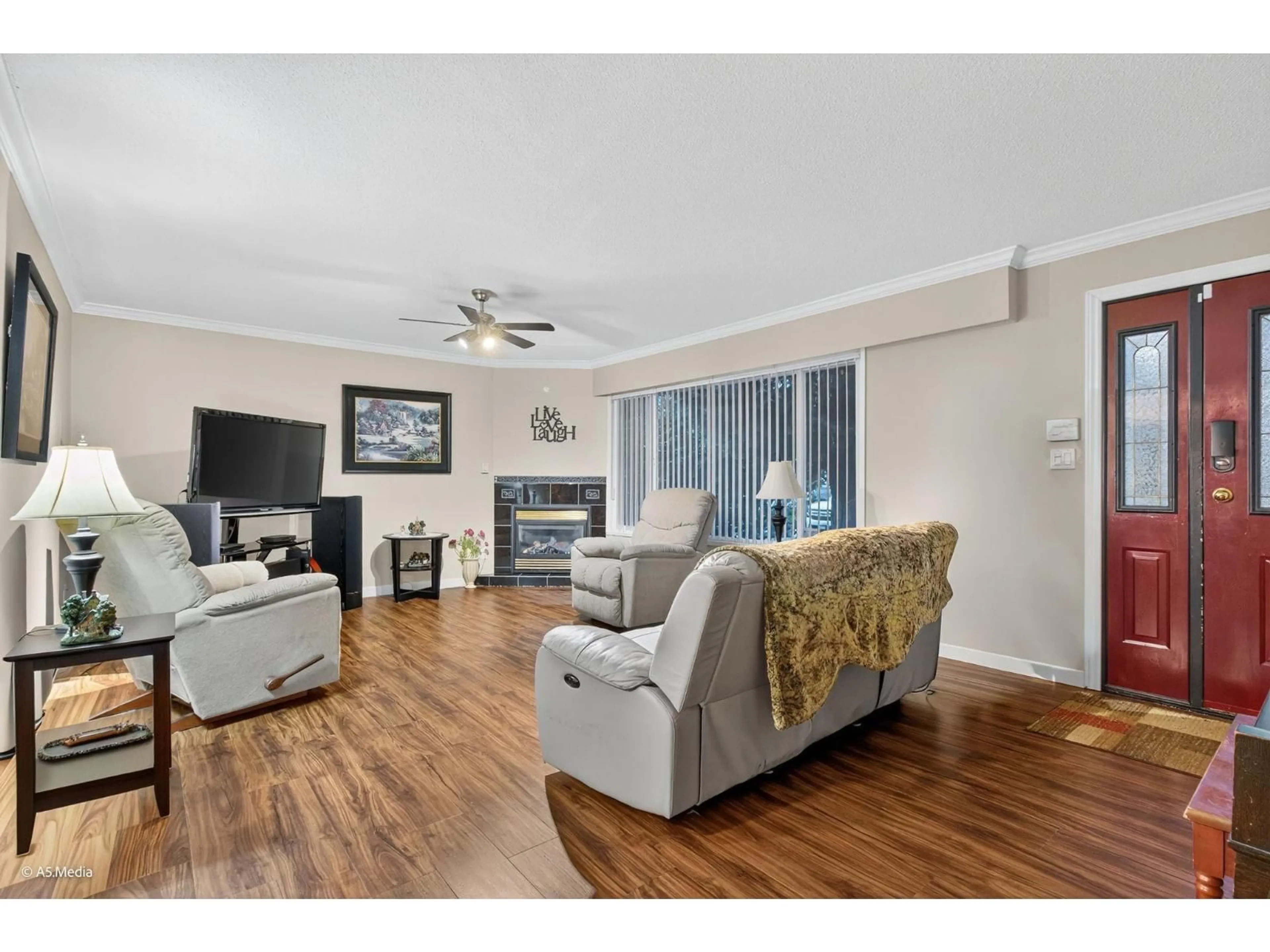 Living room with furniture, wood/laminate floor for 24644 56 AVENUE, Langley British Columbia V2Z1C1