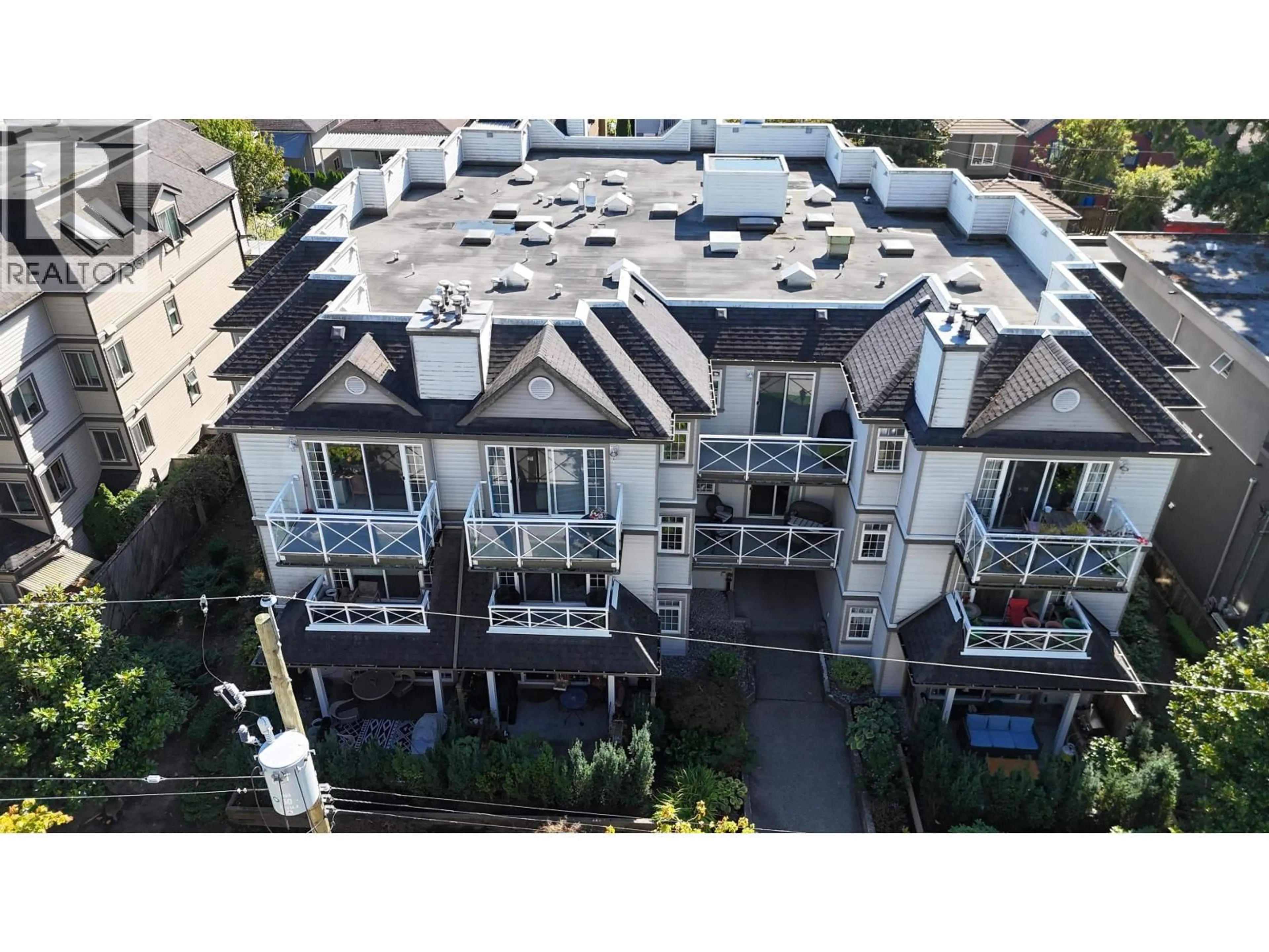 A pic from outside/outdoor area/front of a property/back of a property/a pic from drone, city buildings view from balcony for 106 - 1868 11TH AVENUE, Vancouver British Columbia V5N1Z1