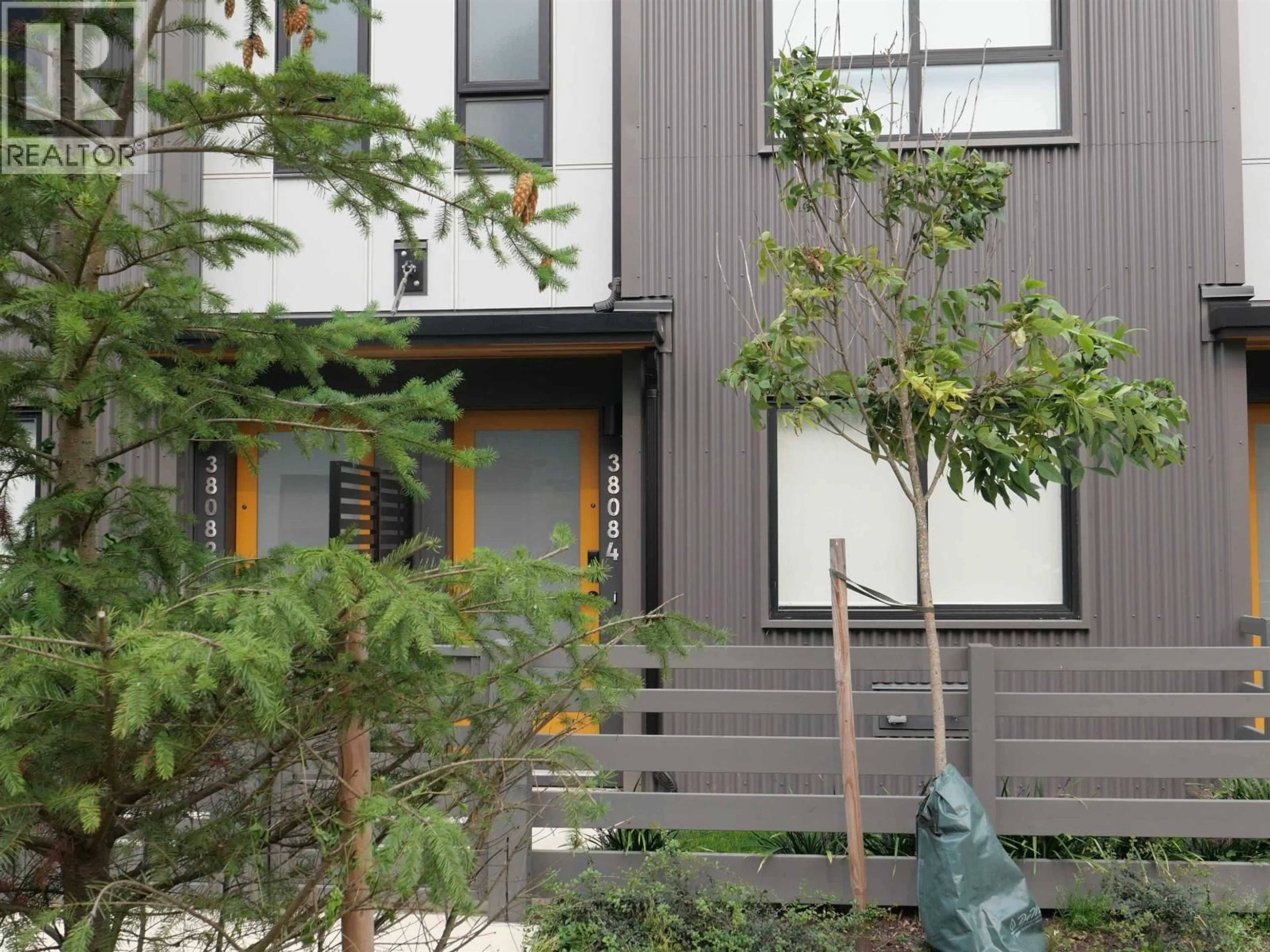 Home with vinyl exterior material, street for 38084 HELM WAY, Squamish British Columbia V8B1E6