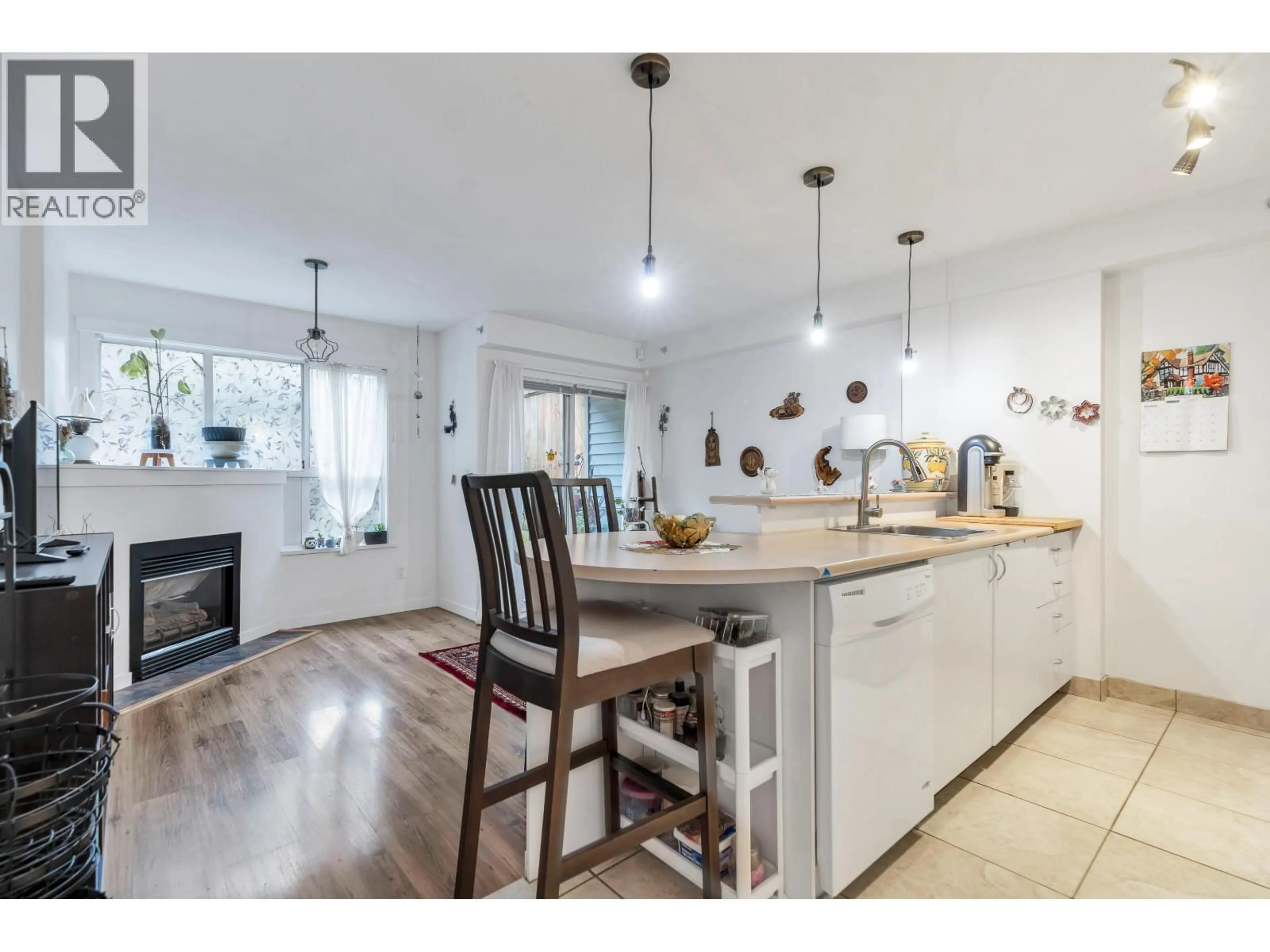 Open concept kitchen, wood/laminate floor for 311 - 528 ROCHESTER AVENUE, Coquitlam British Columbia V3K7A5