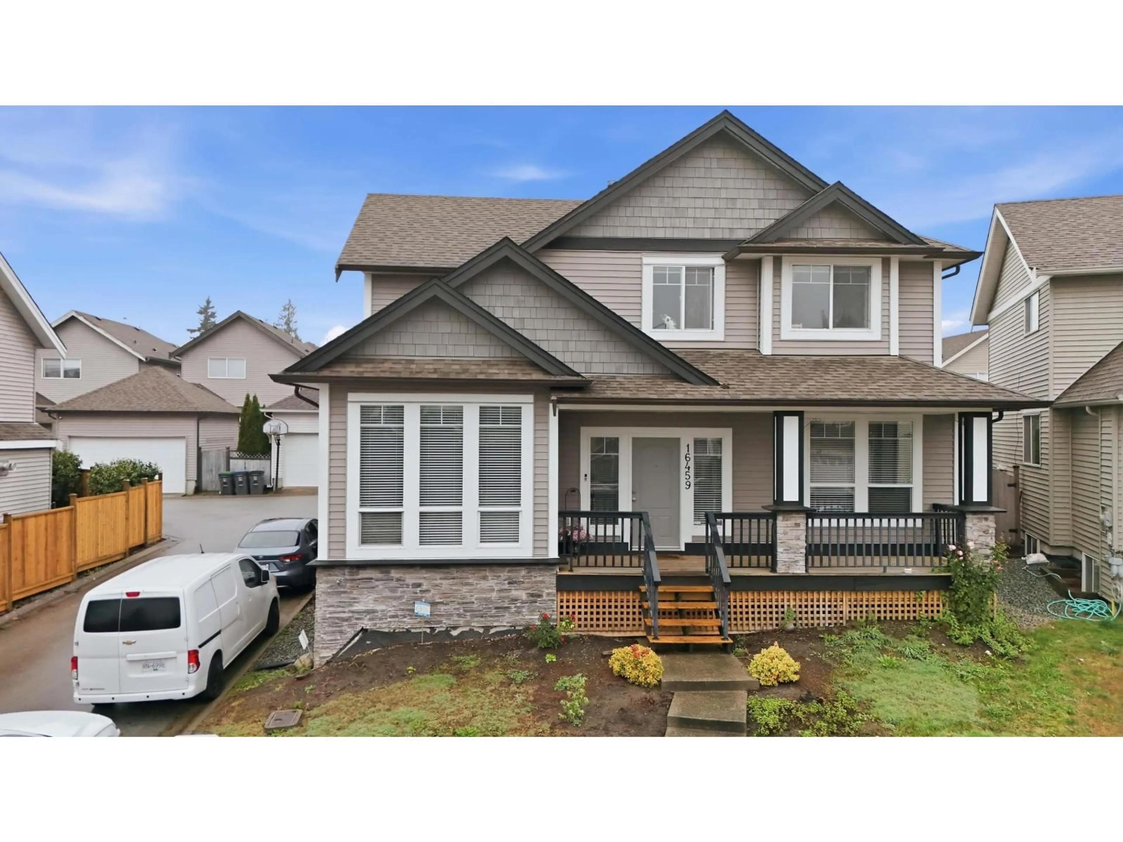 Home with vinyl exterior material, street for 16459 59A, Surrey British Columbia V3S6M6