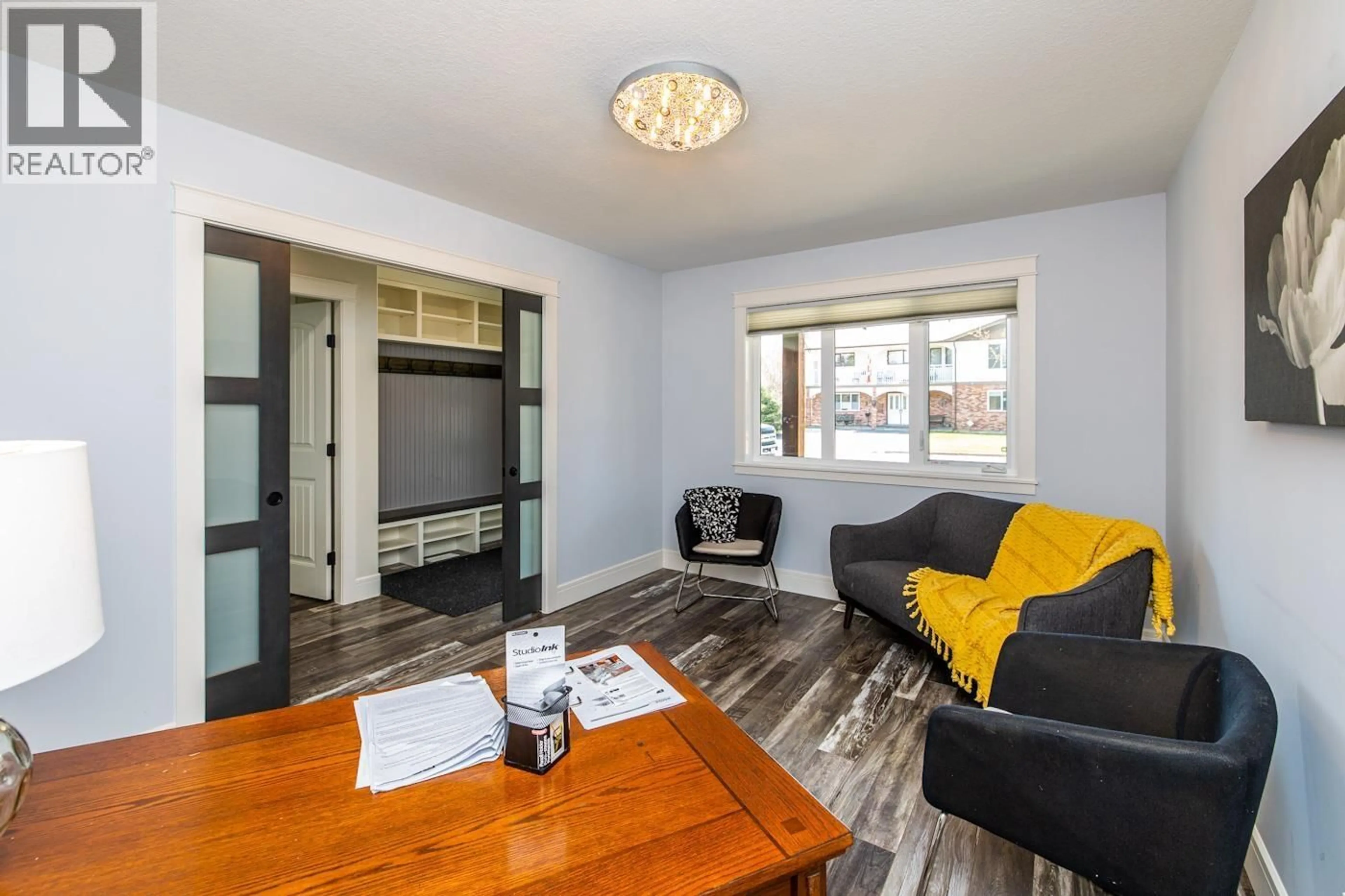 Living room with furniture, wood/laminate floor for 246 BURDEN STREET, Prince George British Columbia V2M2H1