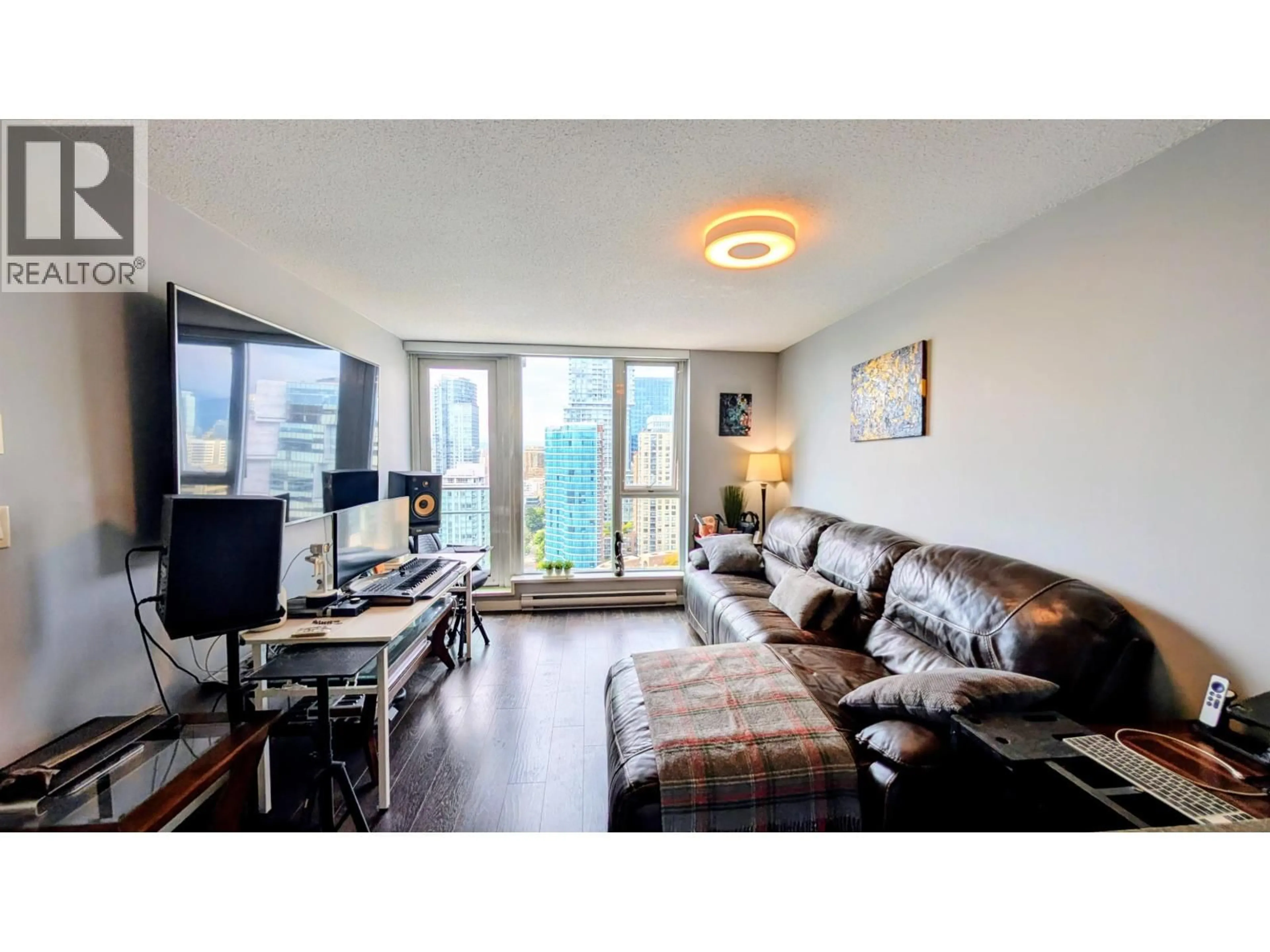 Living room with furniture, wood/laminate floor for 3301 - 233 ROBSON STREET, Vancouver British Columbia V6B0E8