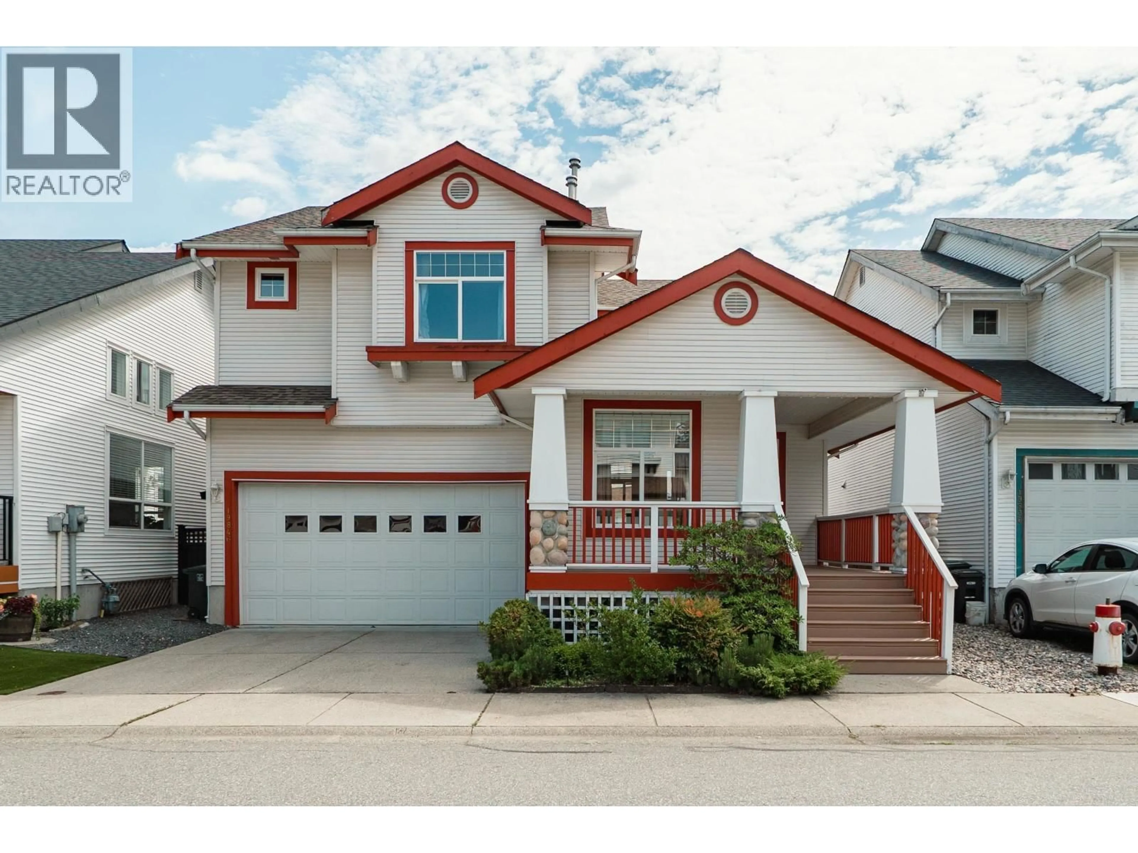 Home with vinyl exterior material, street for 19846 BUTTERNUT LANE, Pitt Meadows British Columbia V3Y2S7