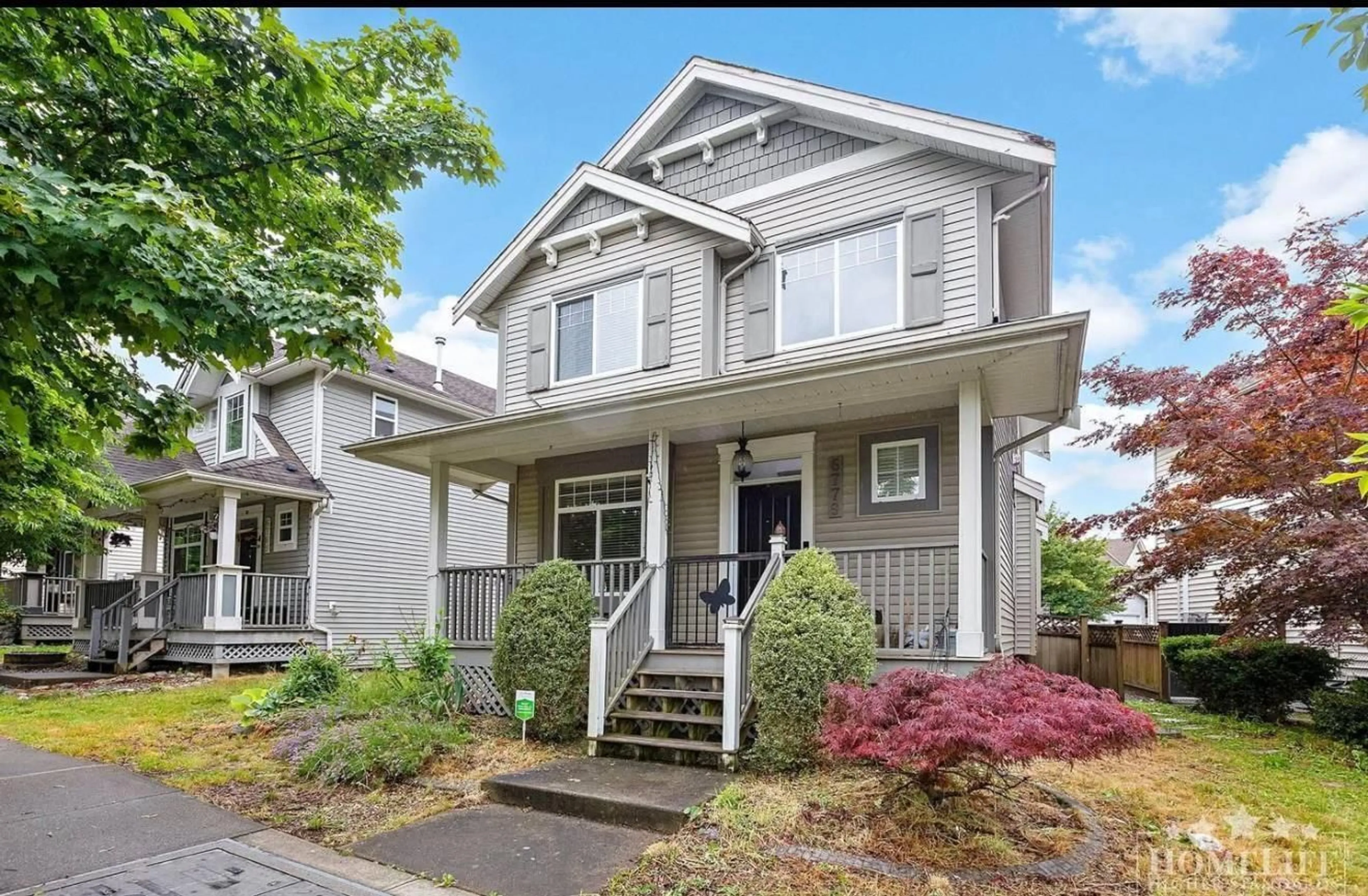 Home with vinyl exterior material, street for 6779 186, Surrey British Columbia V3S1Z1