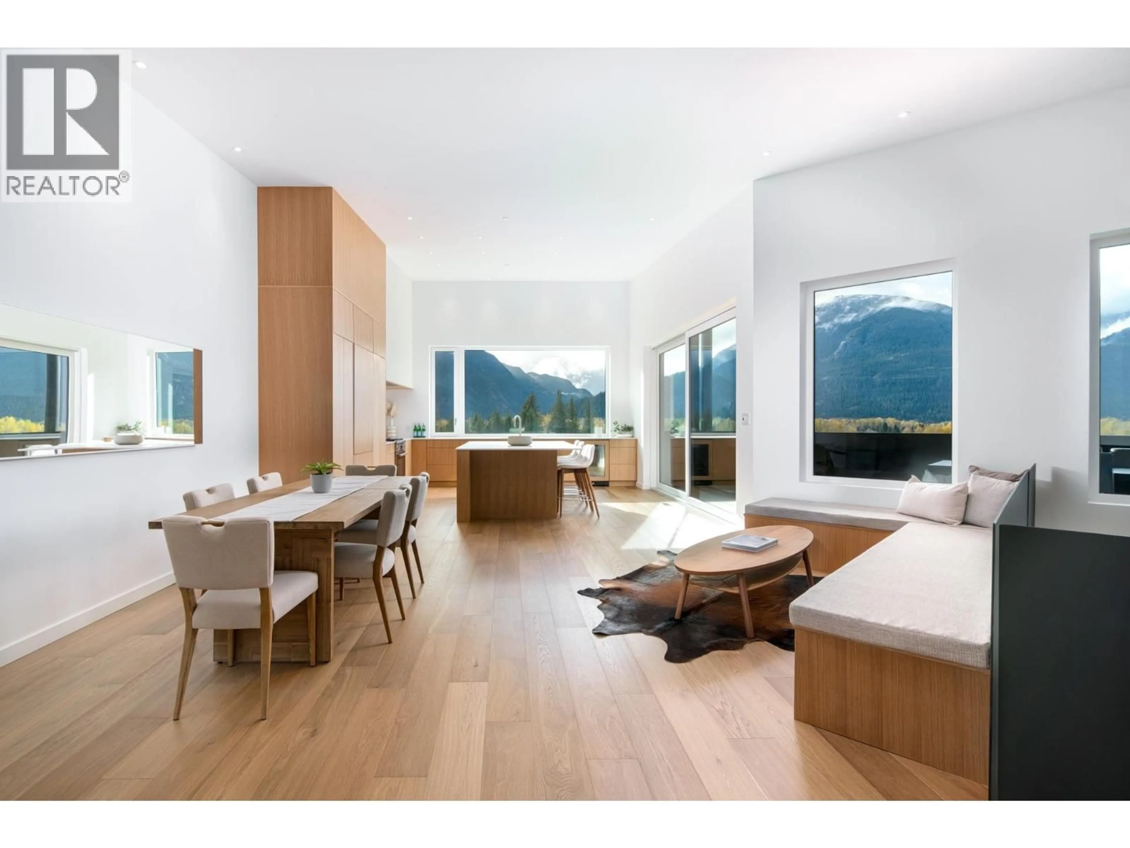 Living room with furniture, wood/laminate floor for 1780 PINEWOOD DRIVE, Pemberton British Columbia V0N2L3