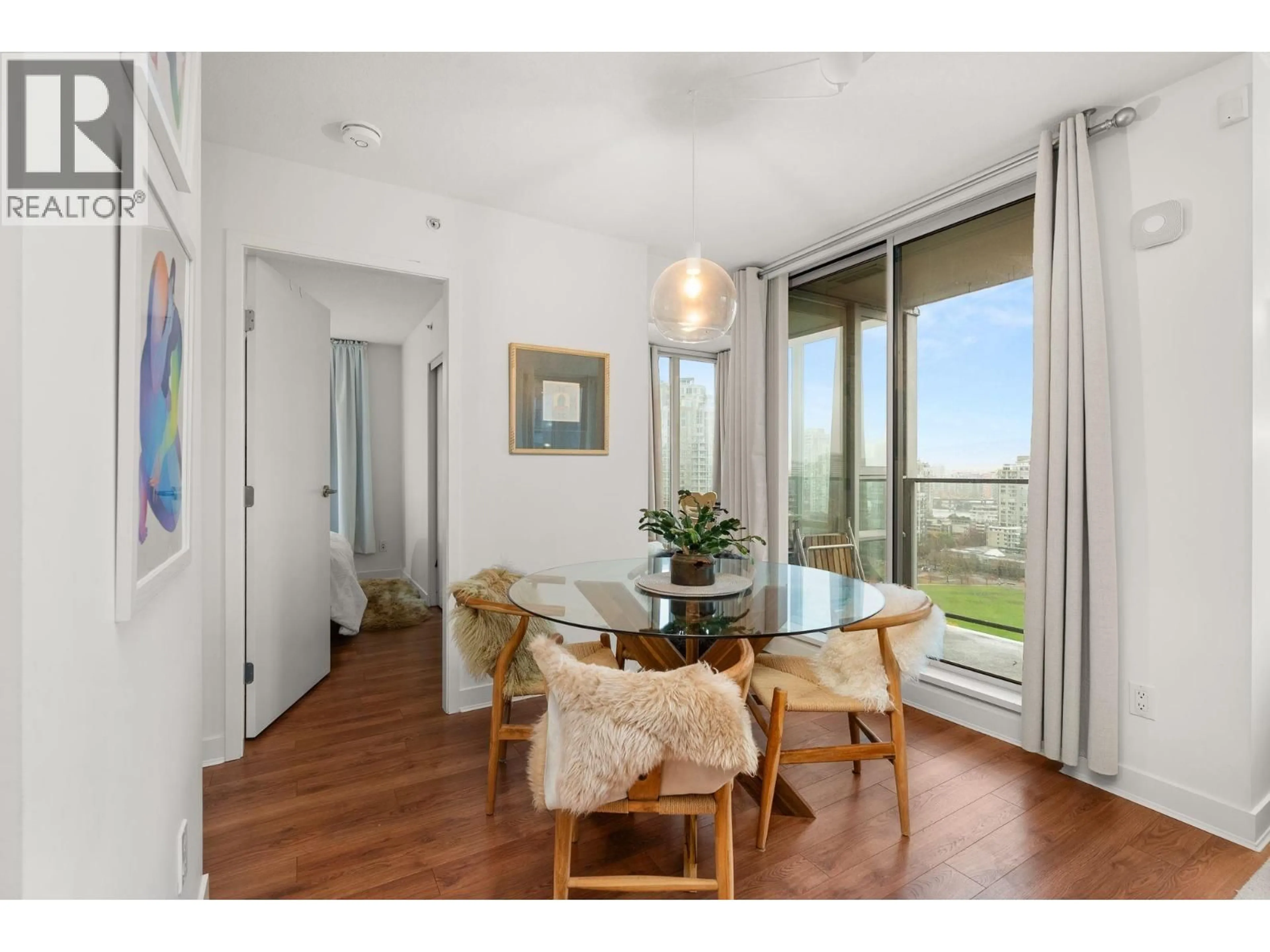 Dining room, wood/laminate floor for 2108 - 1438 RICHARDS STREET, Vancouver British Columbia V6Z3B8