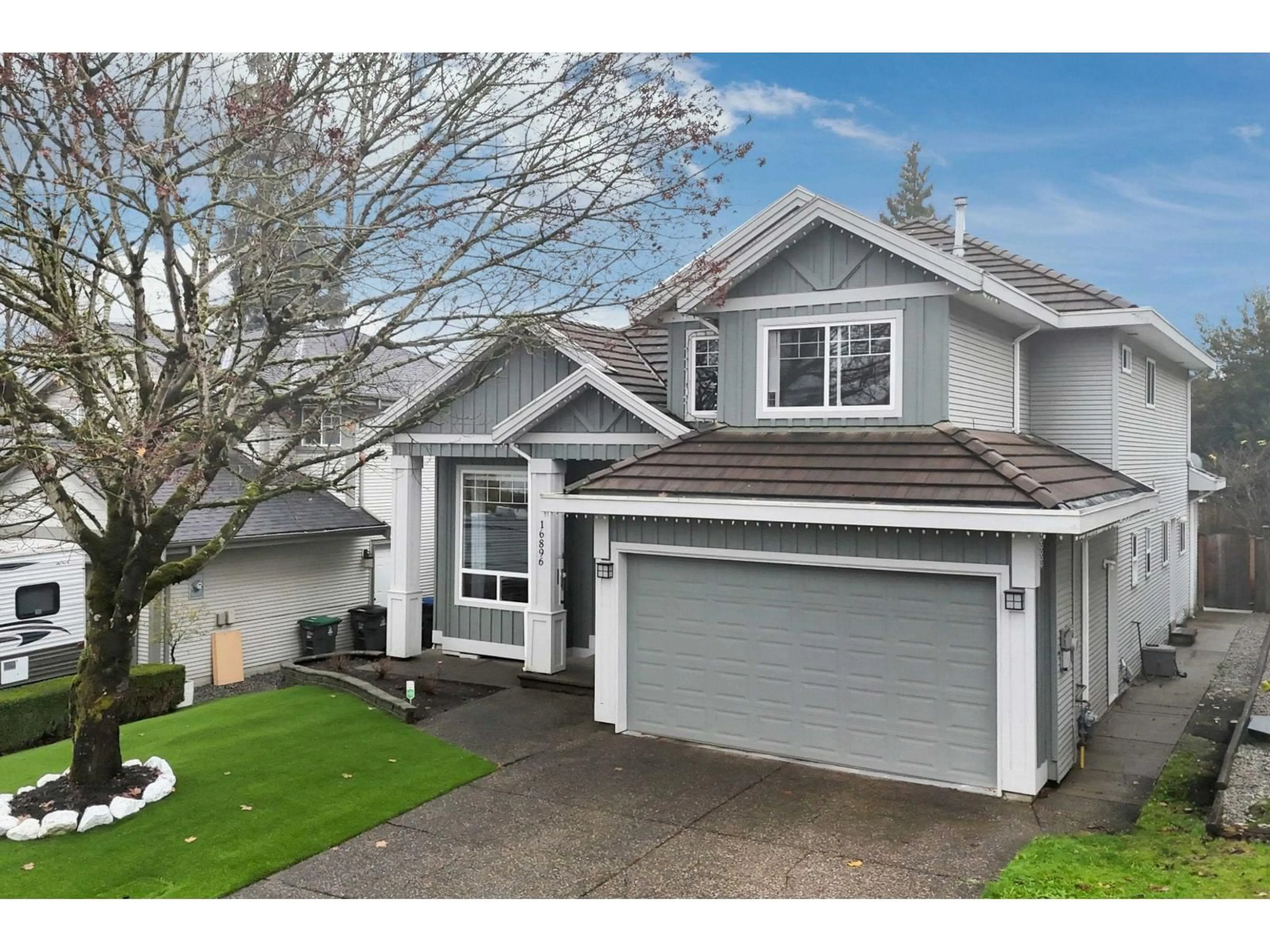 Home with vinyl exterior material, street for 16896 84, Surrey British Columbia V4N4V3