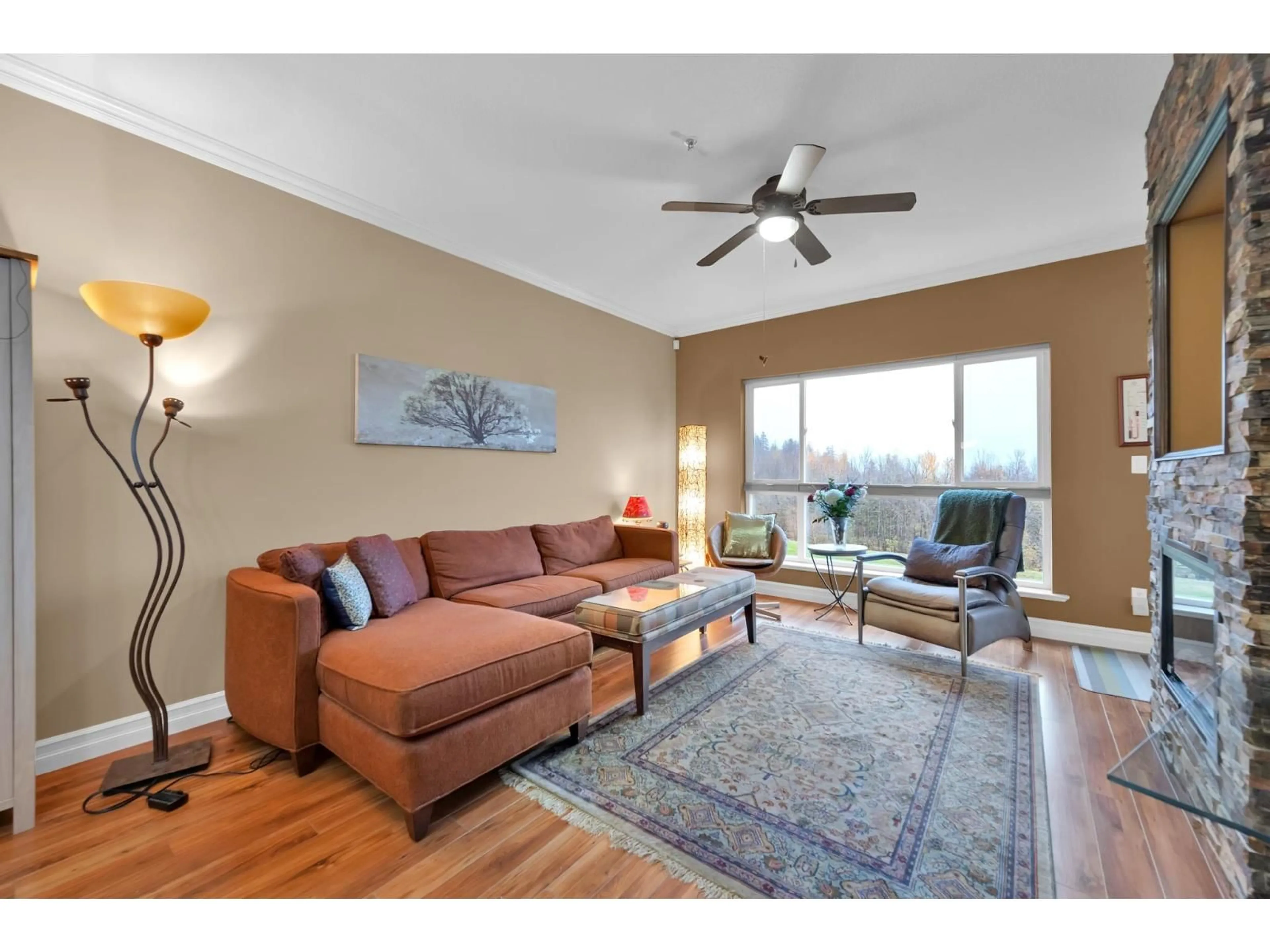 Living room with furniture, wood/laminate floor for 205 - 33755 7, Mission British Columbia V2V0A4