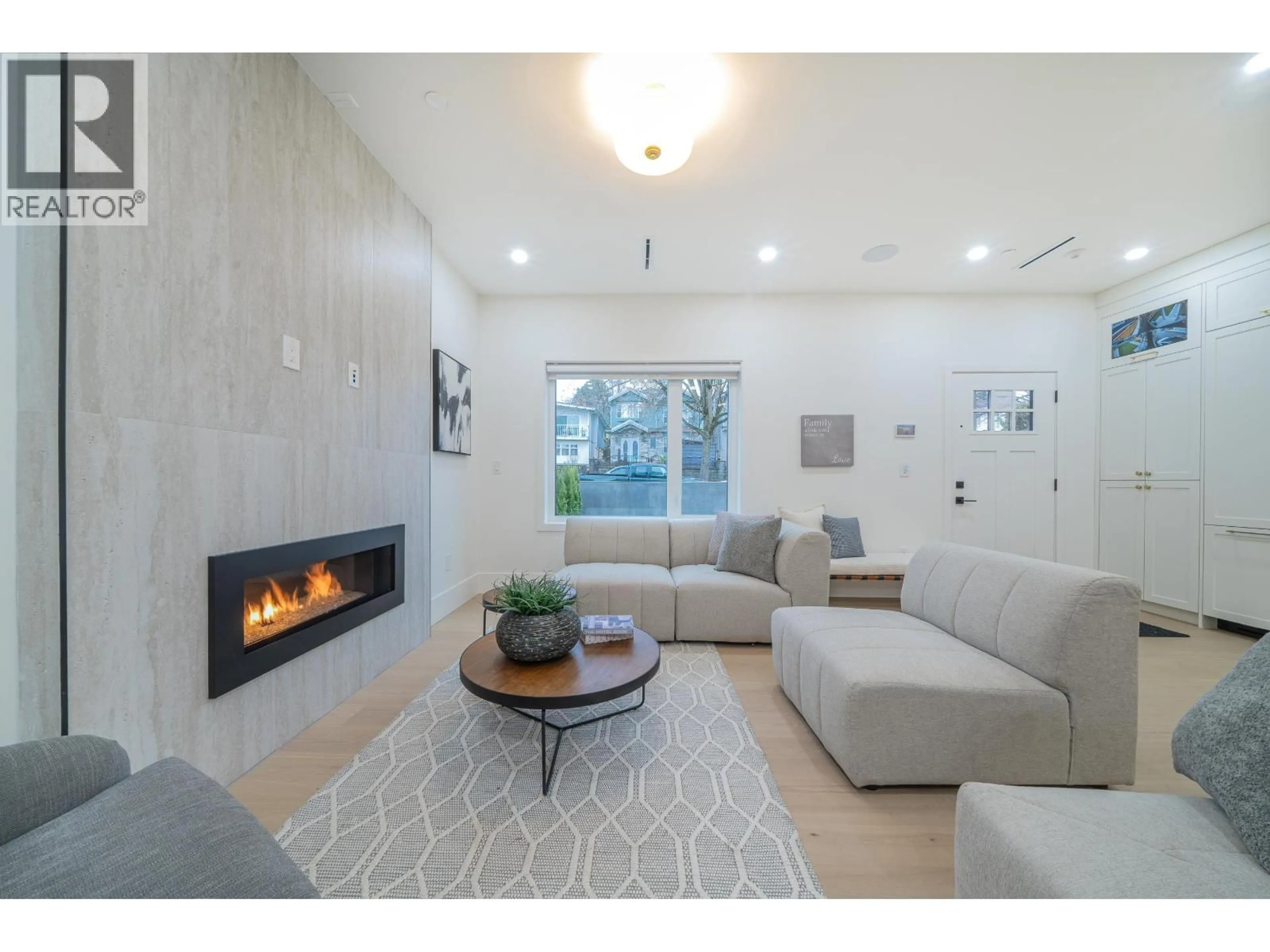 Living room with furniture, ceramic/tile floor for 3460 WELWYN STREET, Vancouver British Columbia V5N3Y7