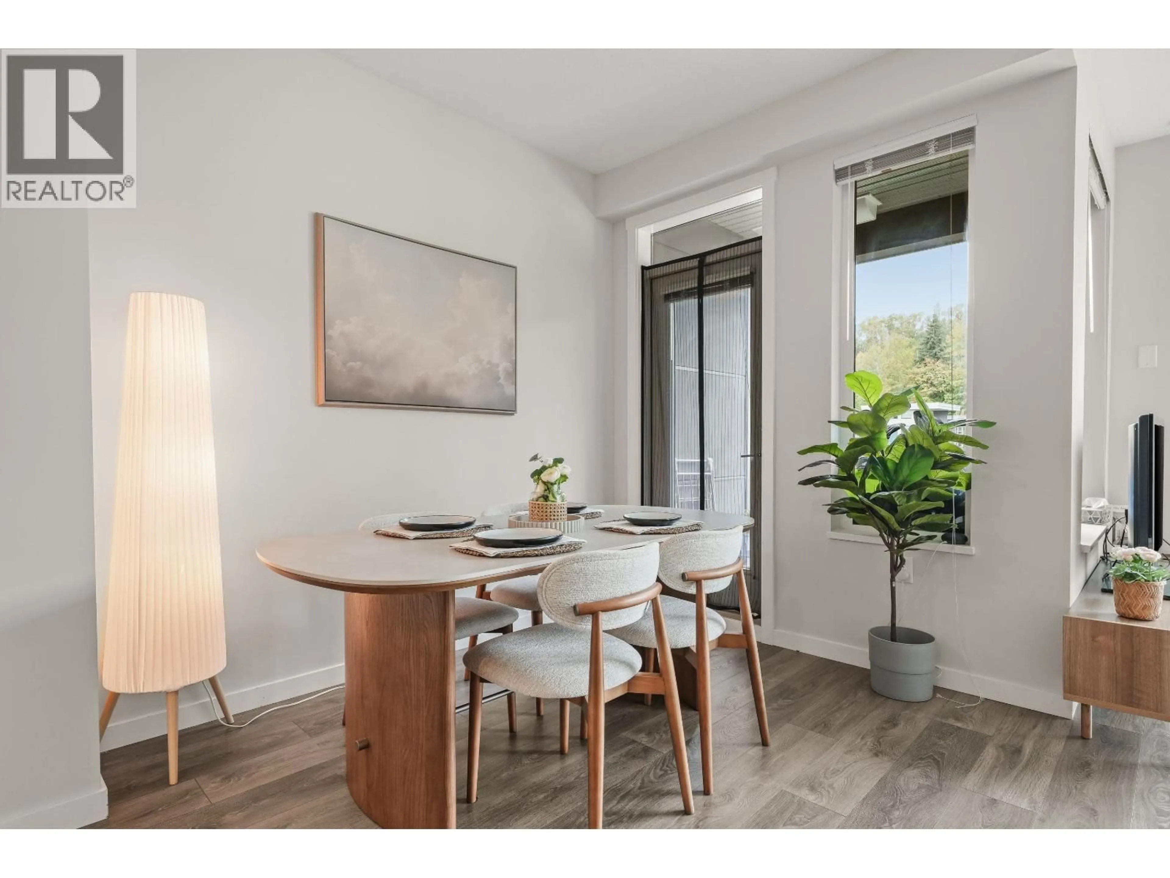 Dining room, wood/laminate floor for 510 - 3289 RIVERWALK AVENUE, Vancouver British Columbia V5S0G2