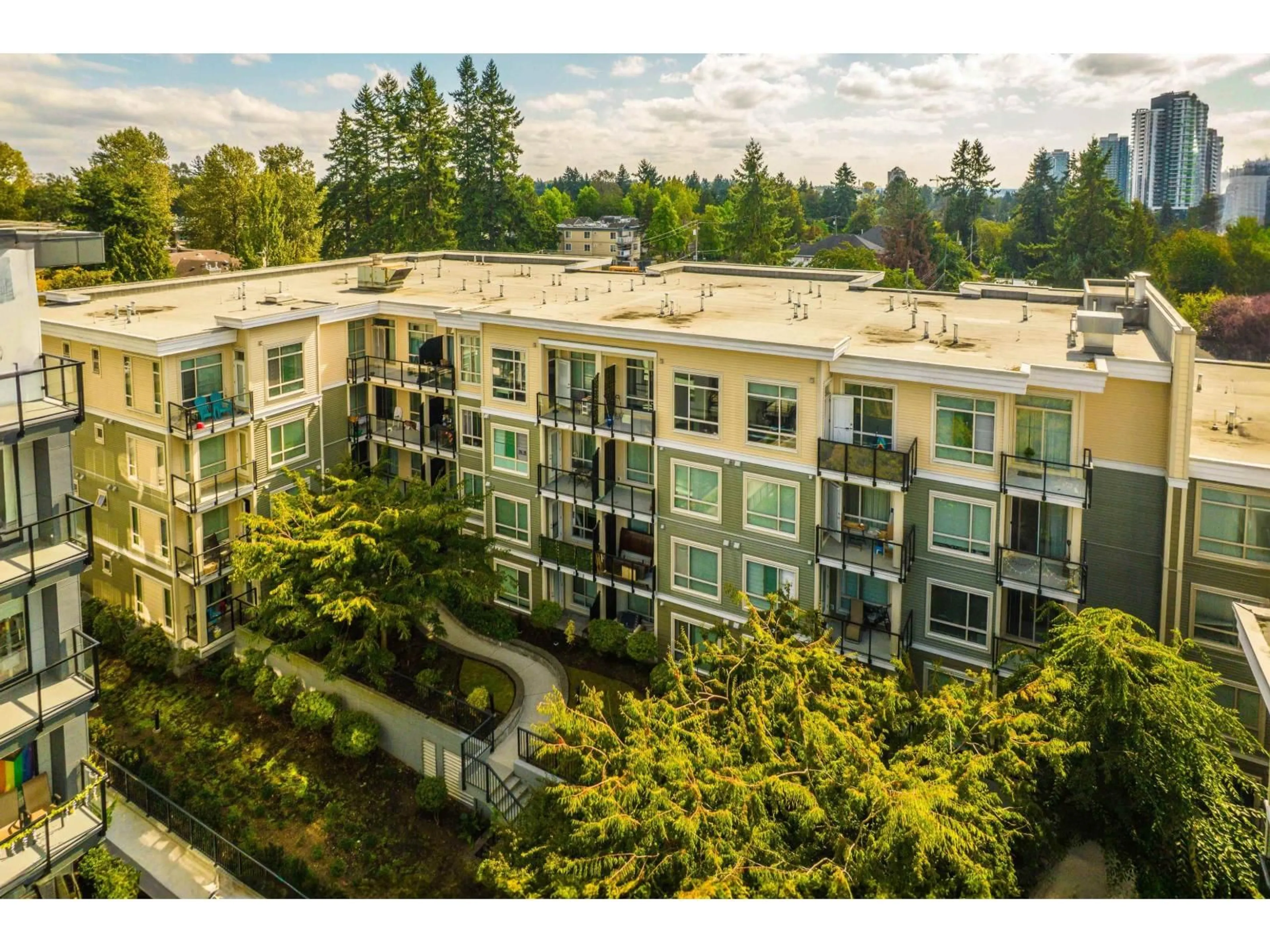 A pic from outside/outdoor area/front of a property/back of a property/a pic from drone, unknown for 106 - 13789 107A AVENUE, Surrey British Columbia V3S0B8