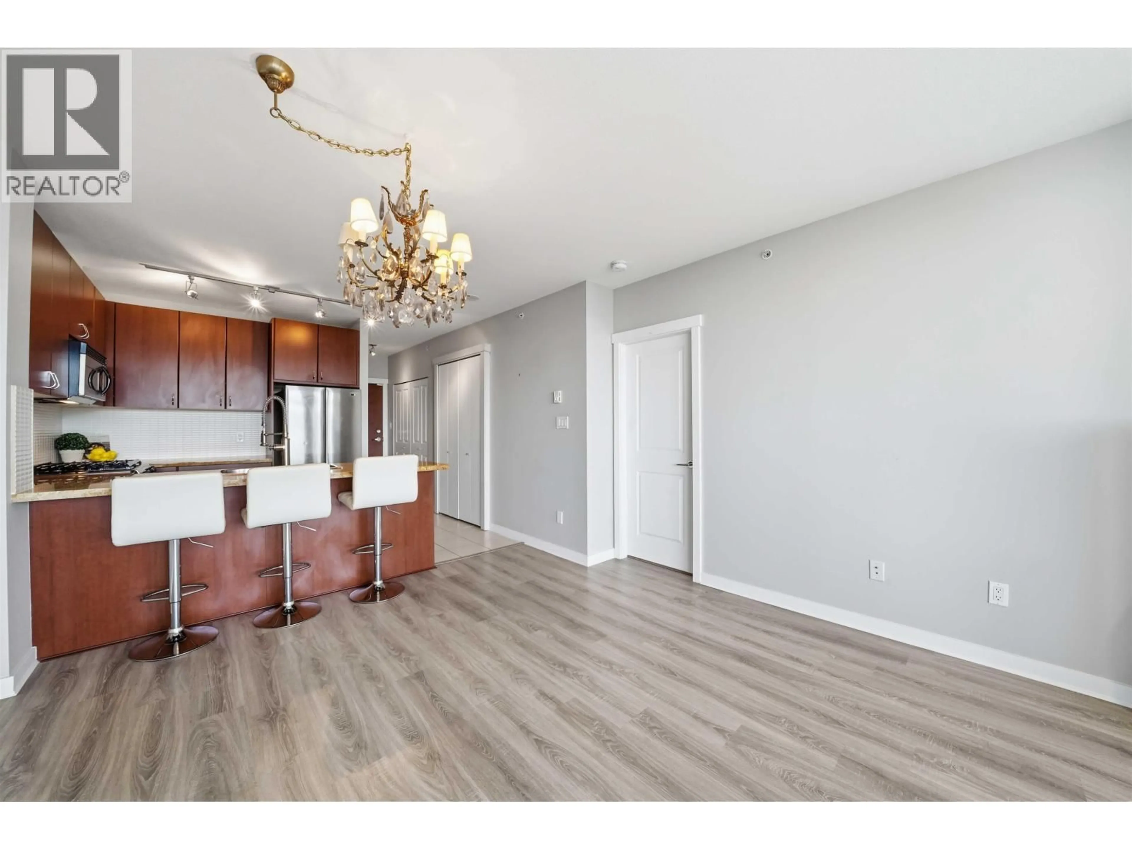 Open concept kitchen, wood/laminate floor for 1107 - 9266 UNIVERSITY CRESCENT, Burnaby British Columbia V5A4Z1