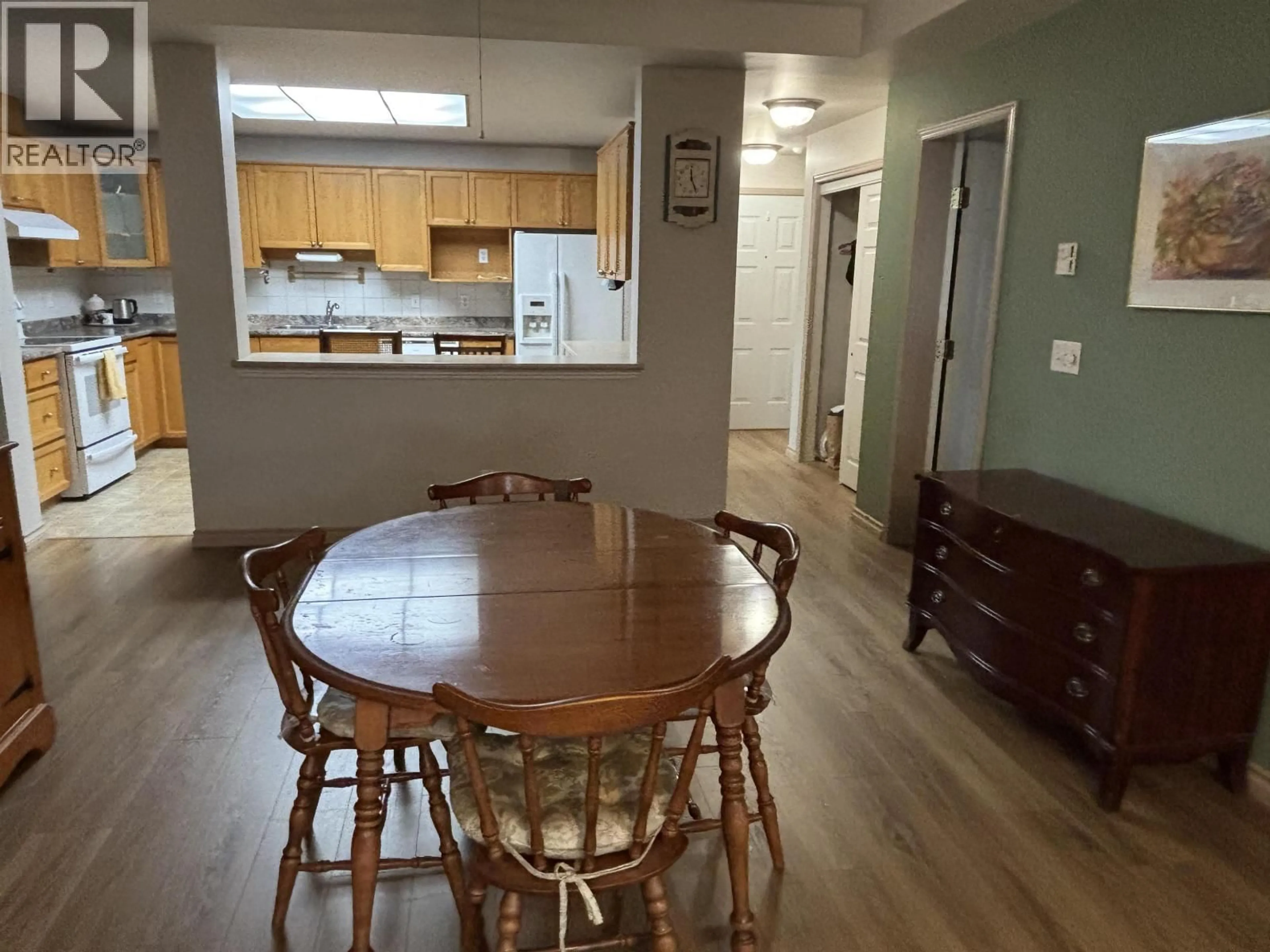 Dining room, wood/laminate floor for 208 - 11609 227 STREET, Maple Ridge British Columbia V2X2L9
