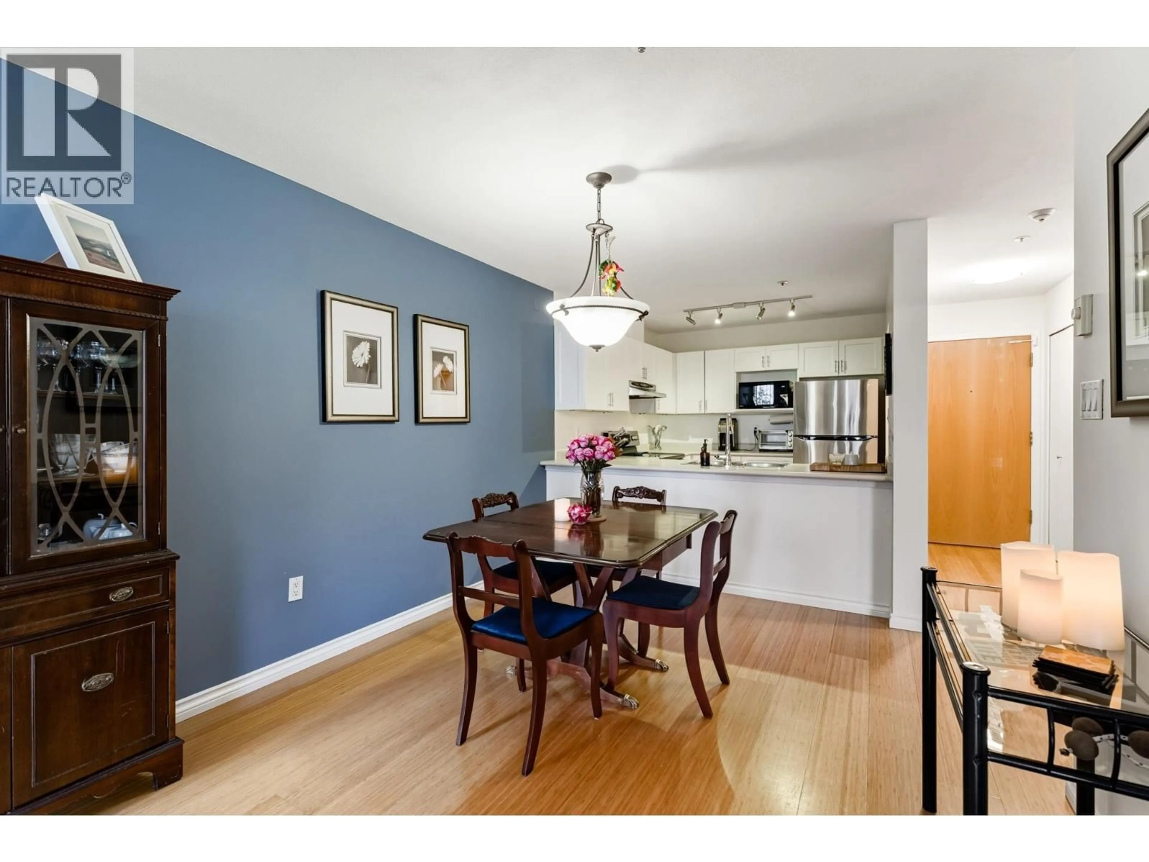Dining room, wood/laminate floor for 320 - 1220 LASALLE PLACE, Coquitlam British Columbia V3B7L6