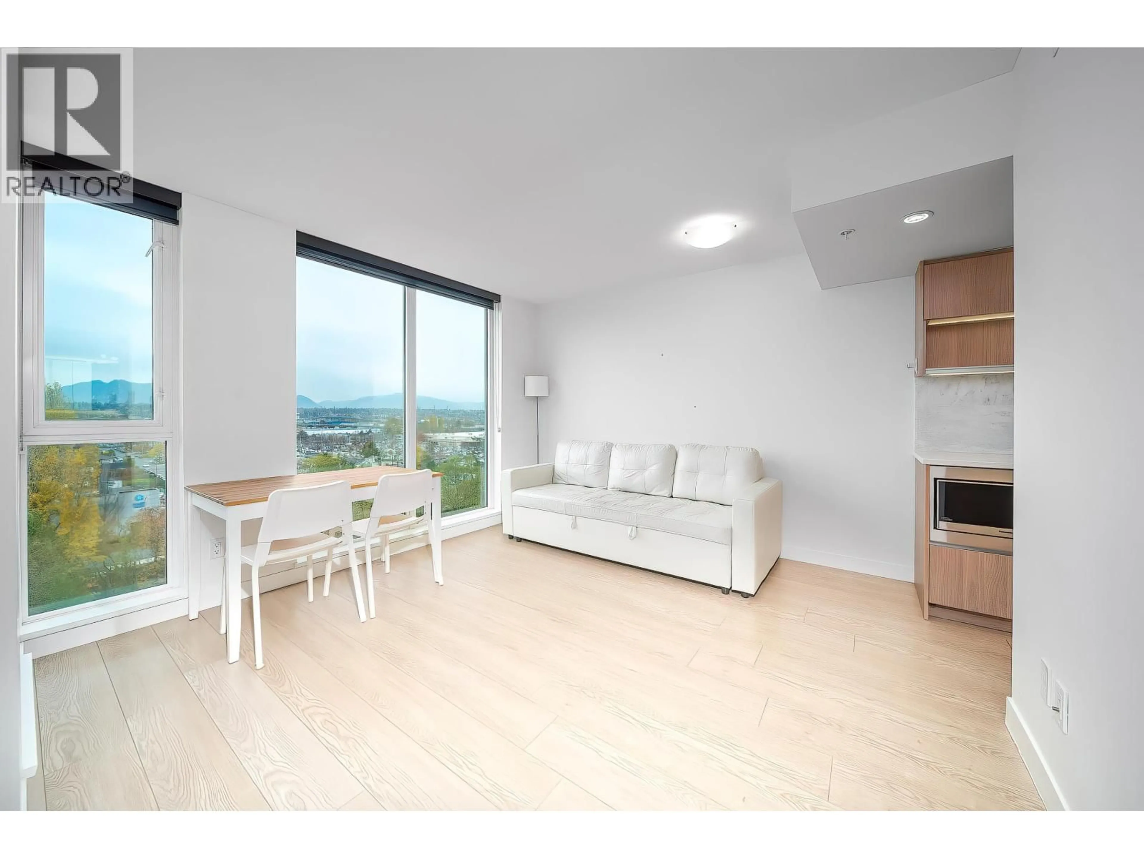 Living room with furniture, wood/laminate floor for 1210 - 8988 PATTERSON ROAD, Richmond British Columbia V6X0R2