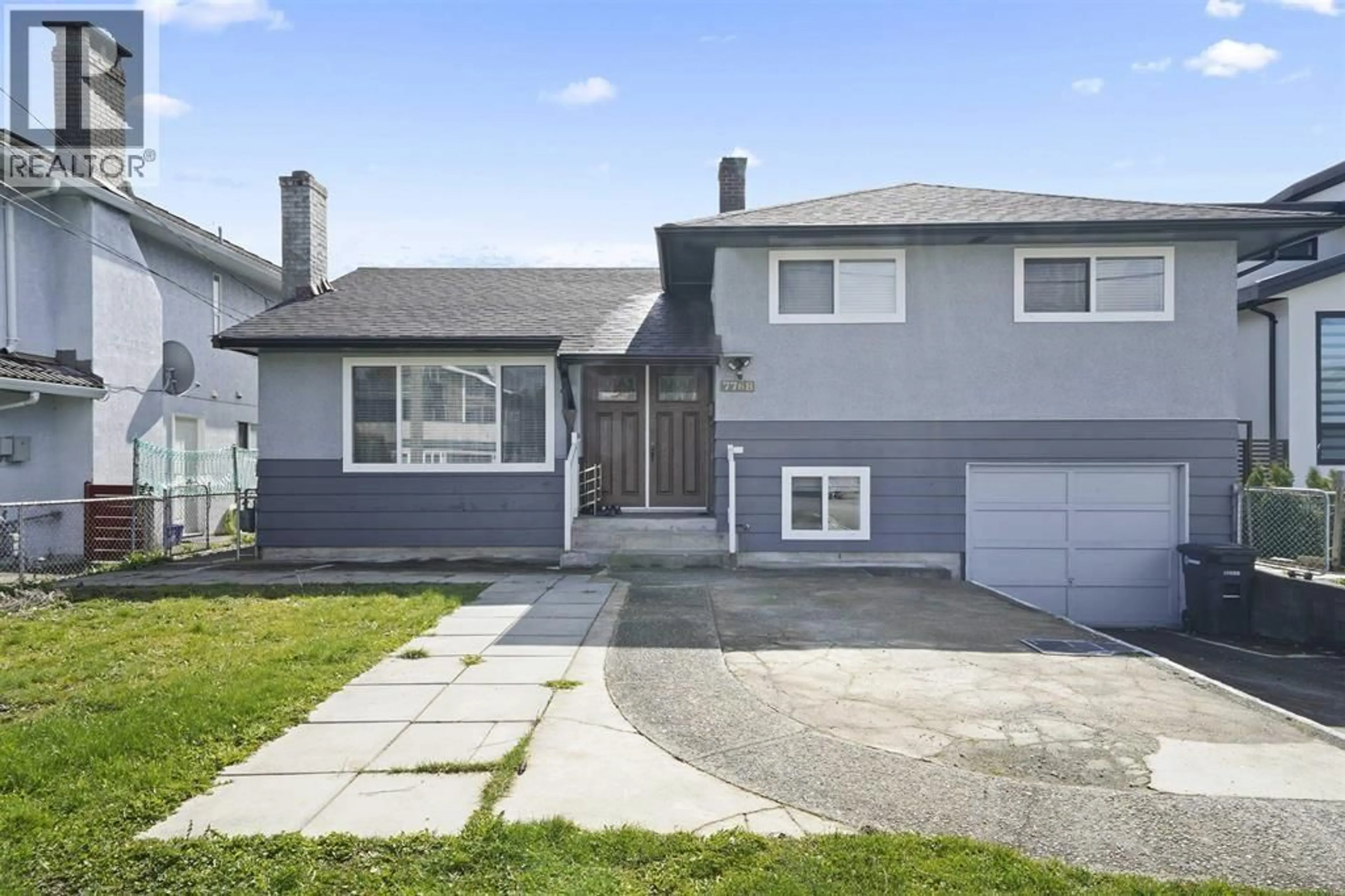 Home with vinyl exterior material, street for 7768 18TH AVENUE, Burnaby British Columbia V3N1J2