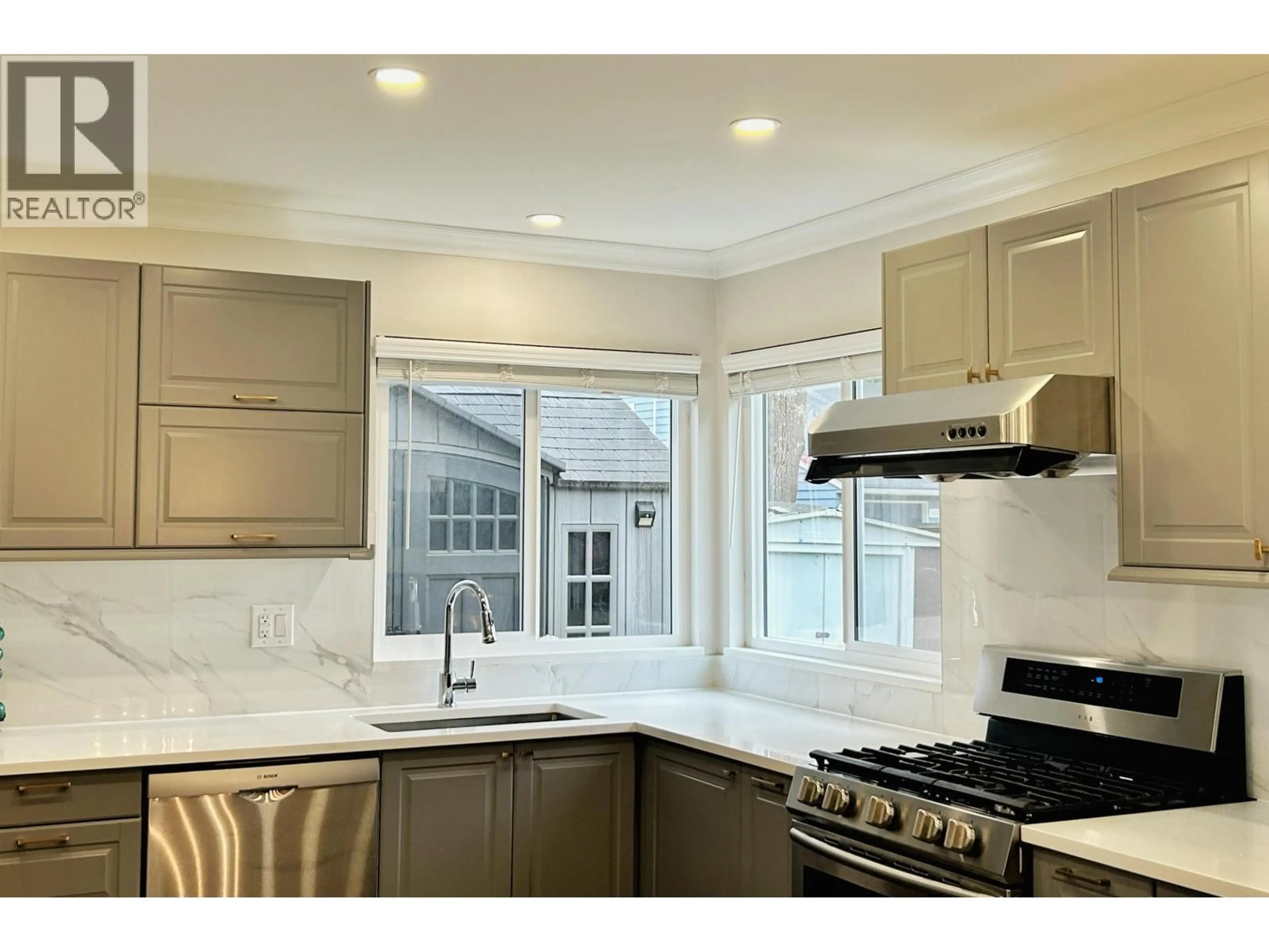 Open concept kitchen, ceramic/tile floor for 10420 TRURO DRIVE, Richmond British Columbia V7E5B4