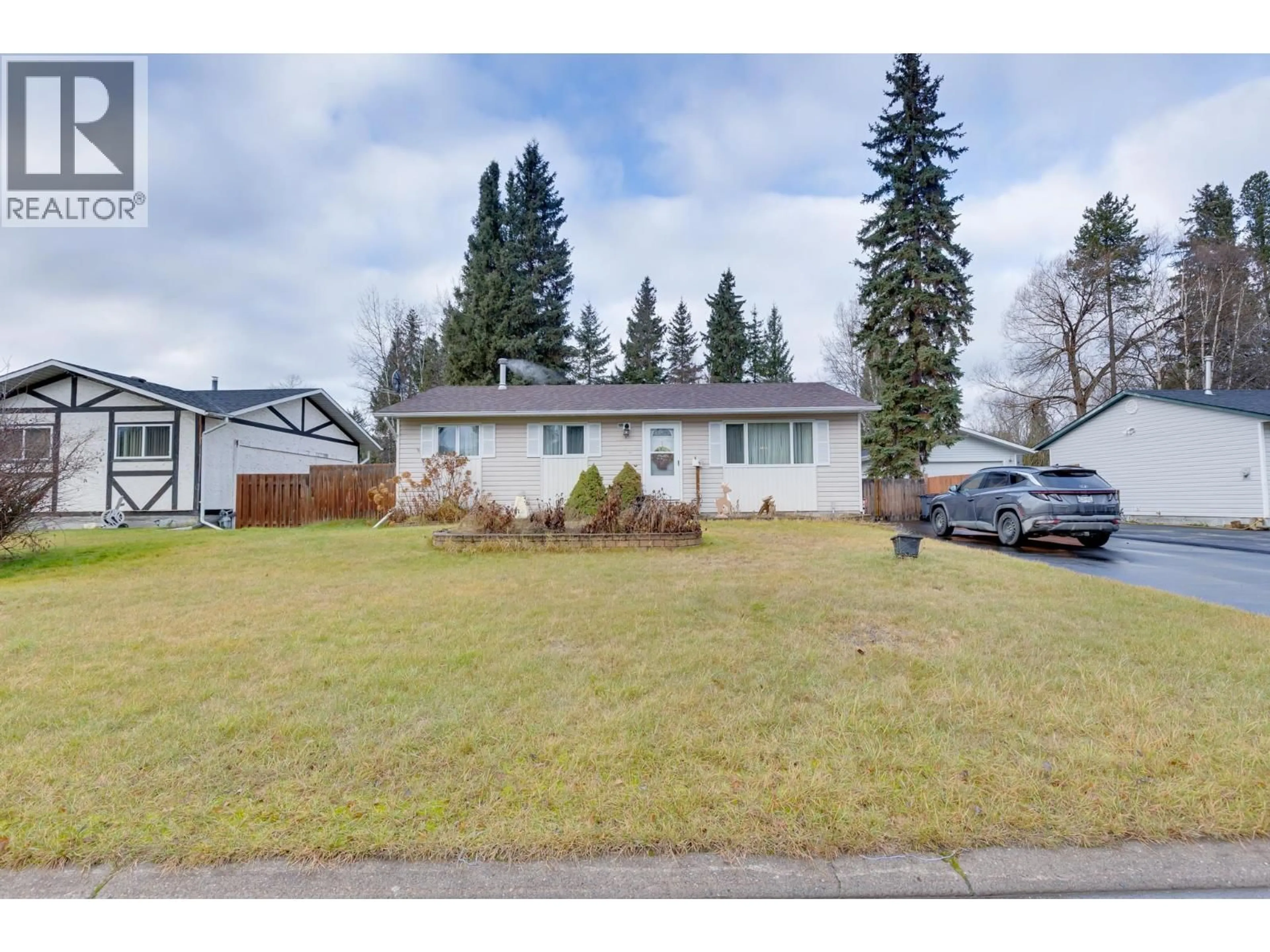 A pic from outside/outdoor area/front of a property/back of a property/a pic from drone, street for 7779 PIEDMONT CRESCENT, Prince George British Columbia V2N2C5