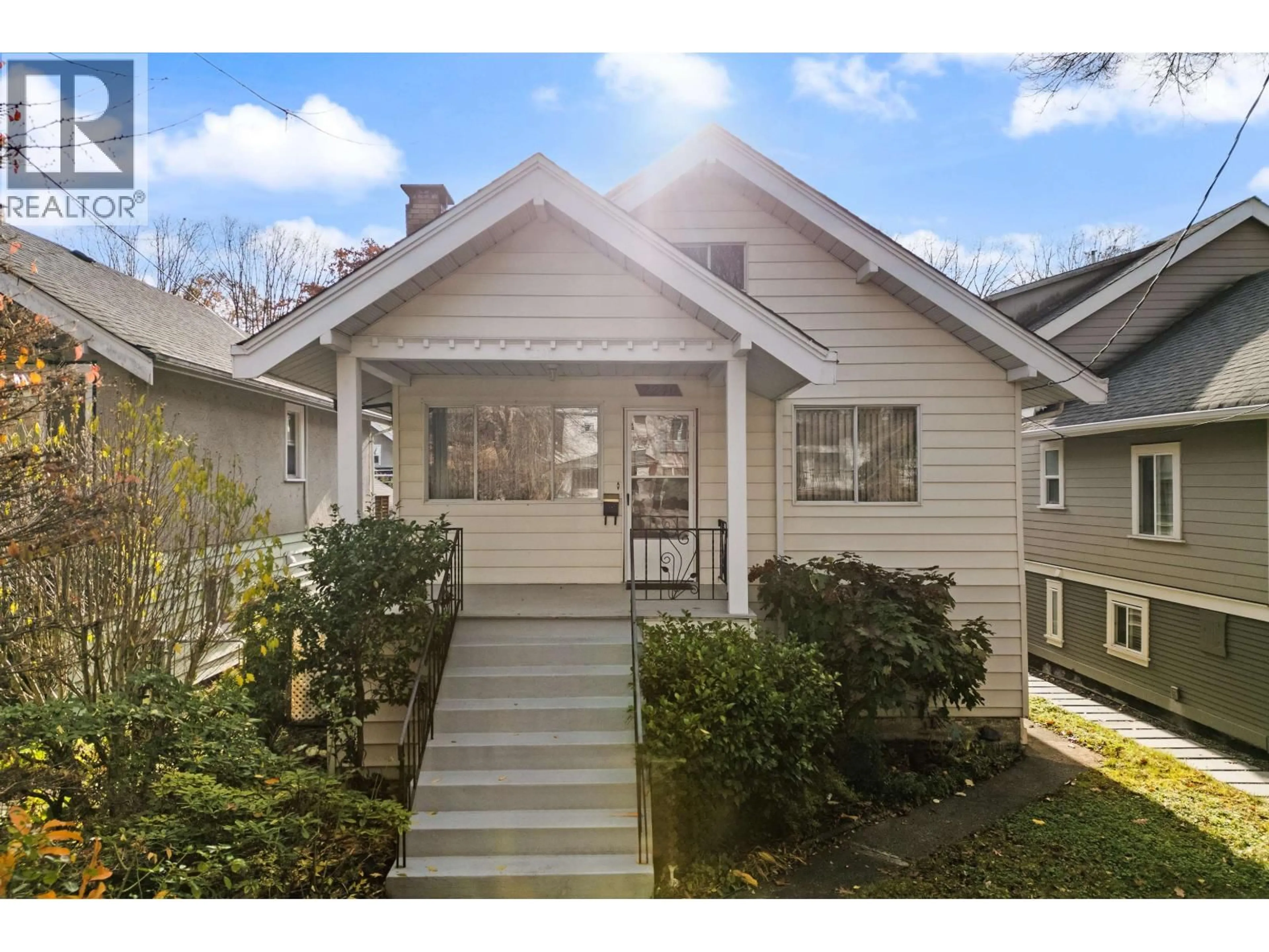 Home with vinyl exterior material, street for 2240 E 6TH AVENUE, Vancouver British Columbia V5N1R1