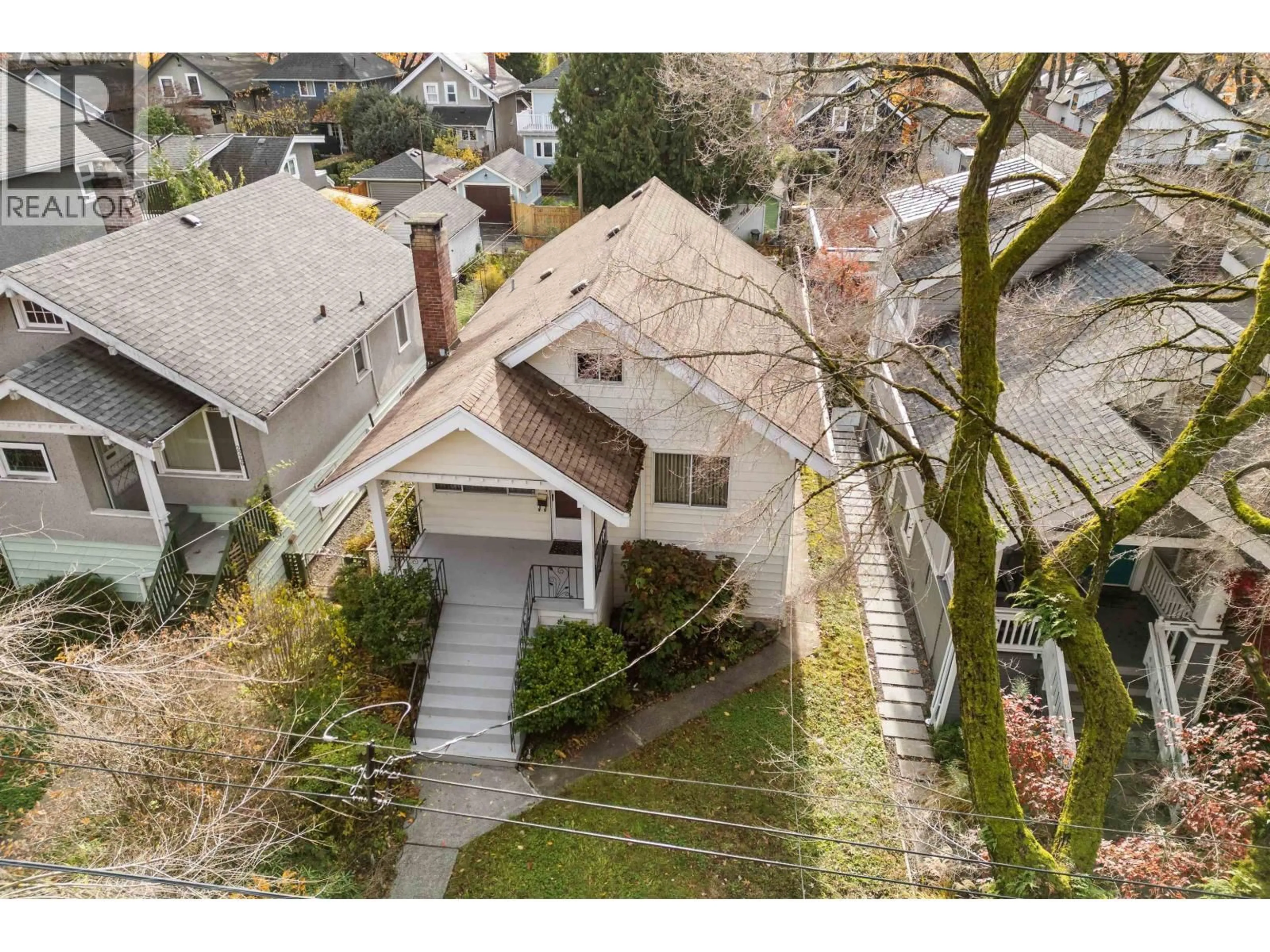 A pic from outside/outdoor area/front of a property/back of a property/a pic from drone, street for 2240 E 6TH AVENUE, Vancouver British Columbia V5N1R1