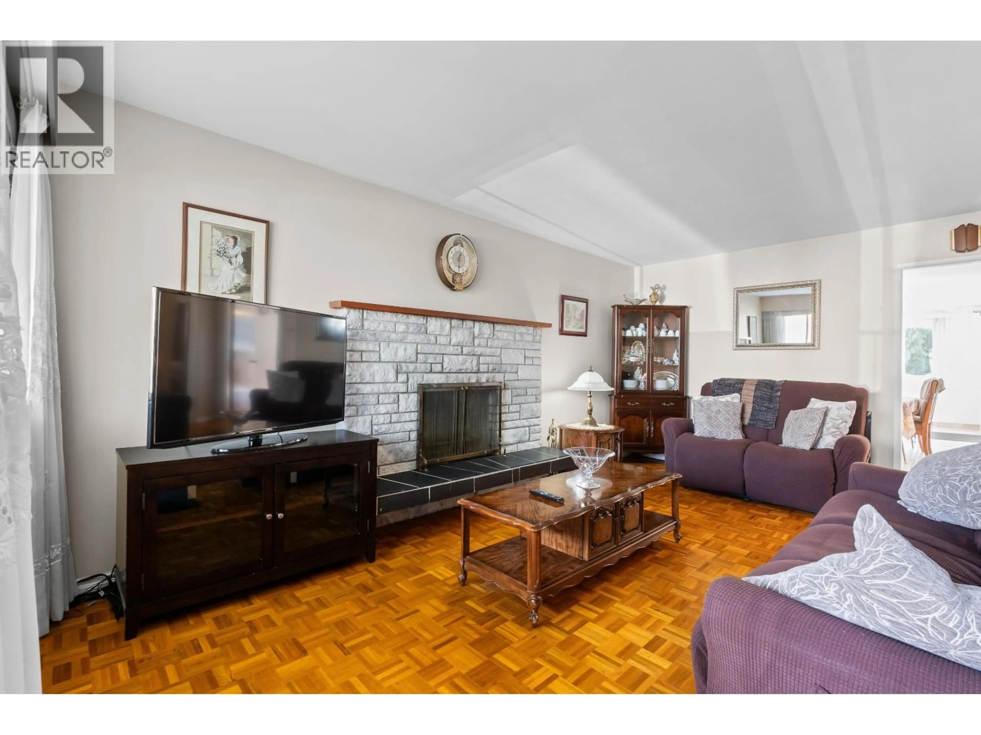 Living room with furniture, wood/laminate floor for 2240 E 6TH AVENUE, Vancouver British Columbia V5N1R1