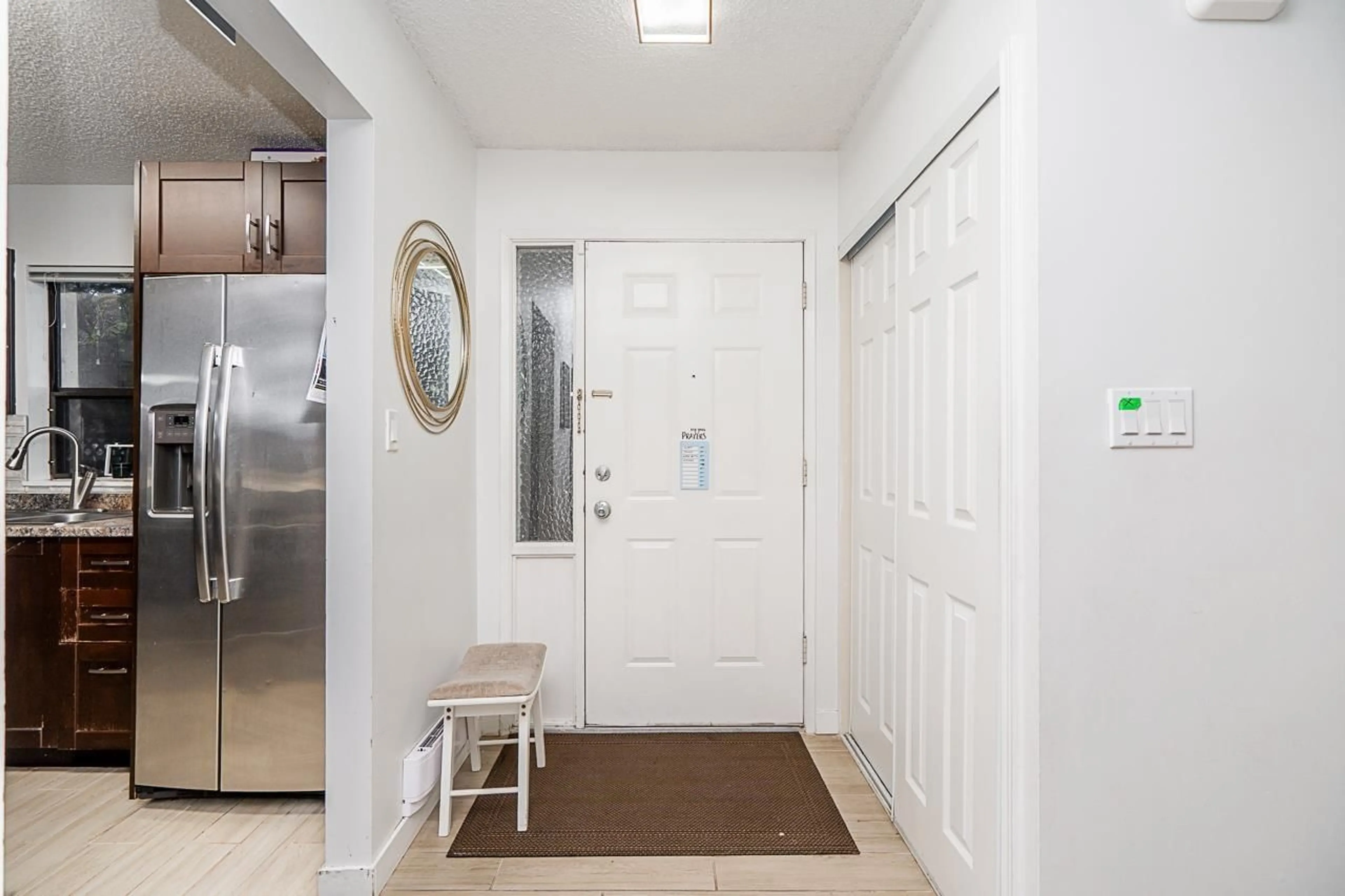 Indoor entryway for 101 - 7064 133B STREET, Surrey British Columbia V3W8A4