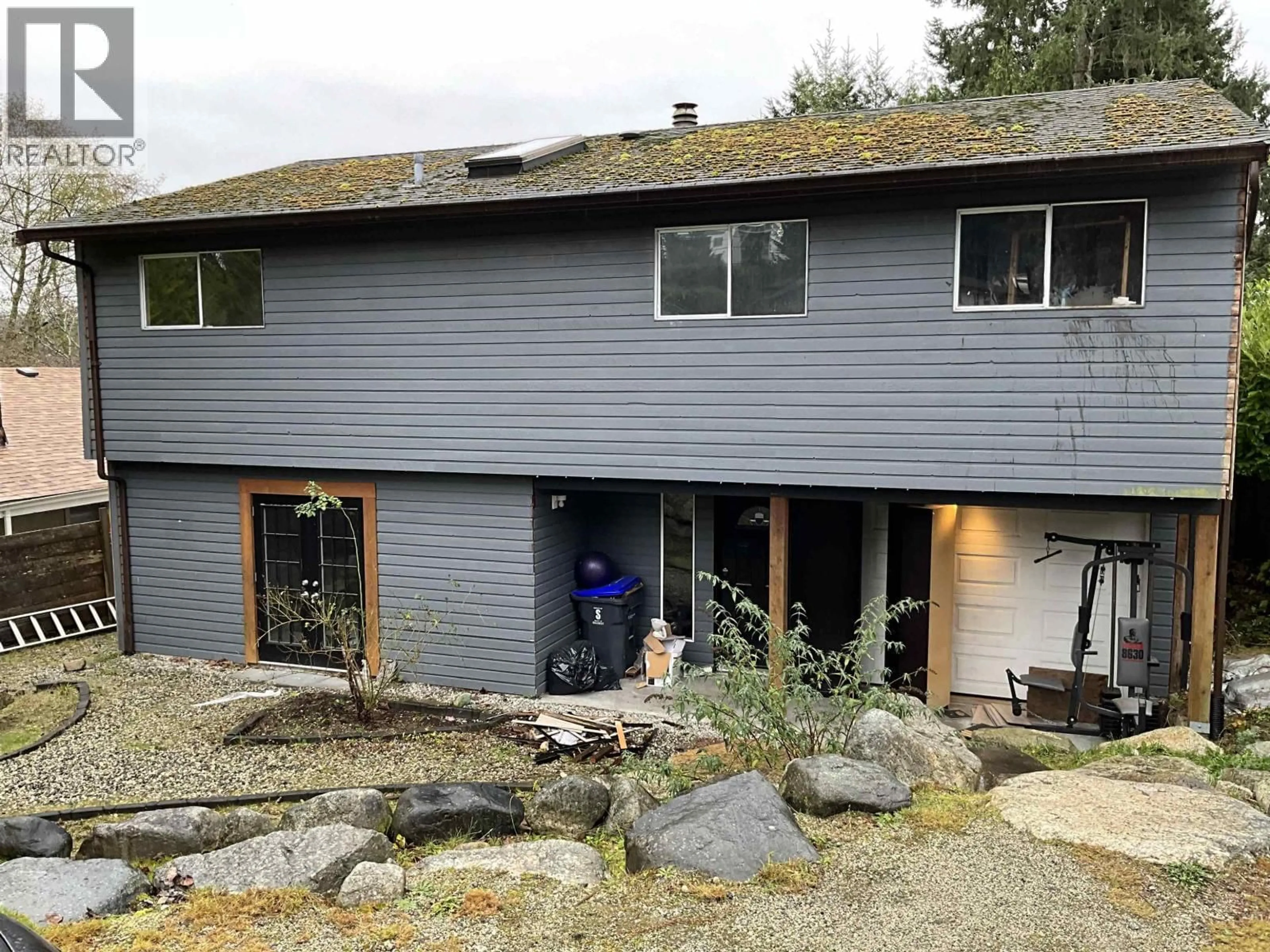 A pic from outside/outdoor area/front of a property/back of a property/a pic from drone, unknown for 5799 ANCHOR ROAD, Sechelt British Columbia V0N3A0