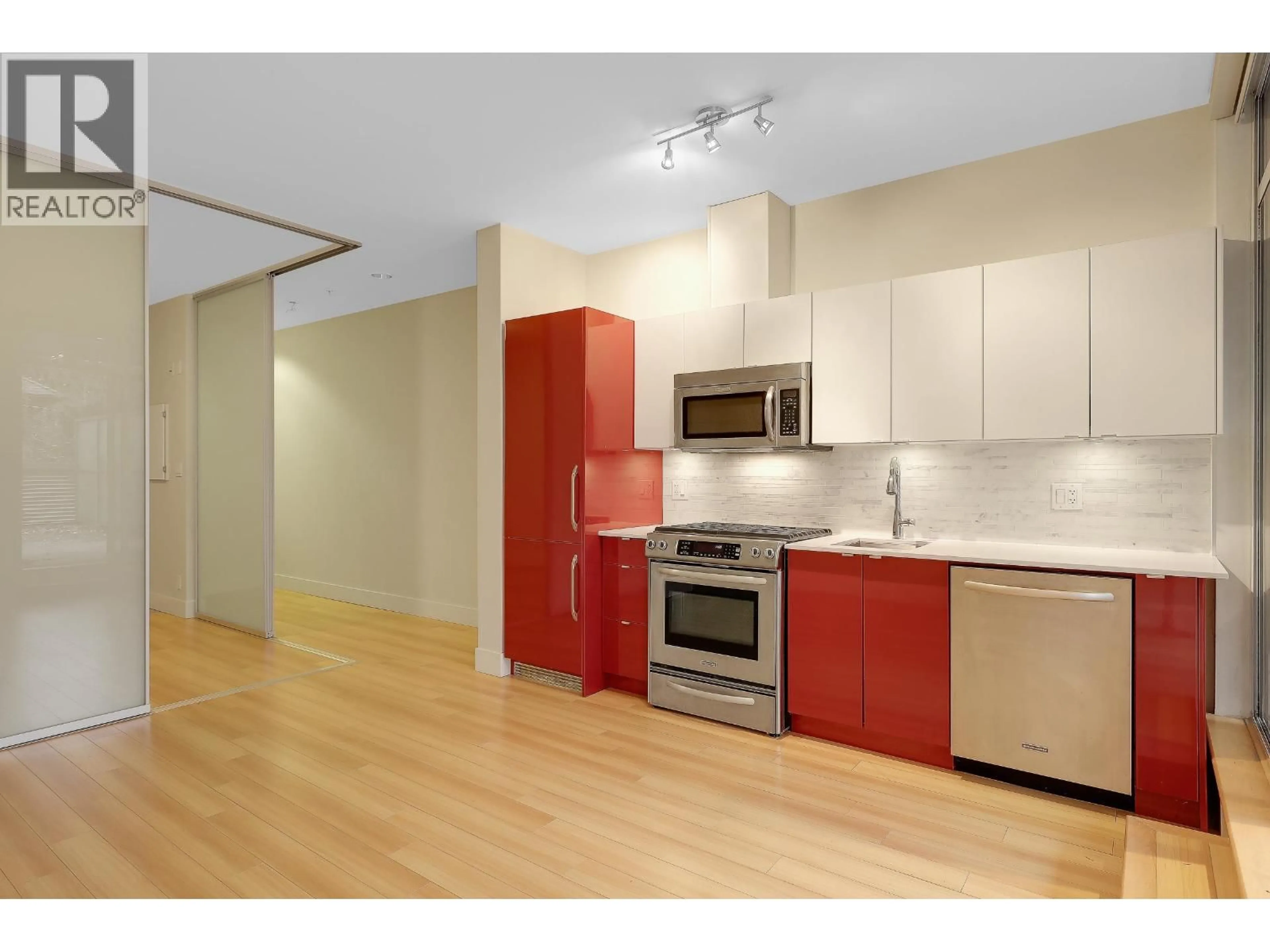 Standard kitchen, wood/laminate floor for 211 - 2250 COMMERCIAL DRIVE, Vancouver British Columbia V5N5P9