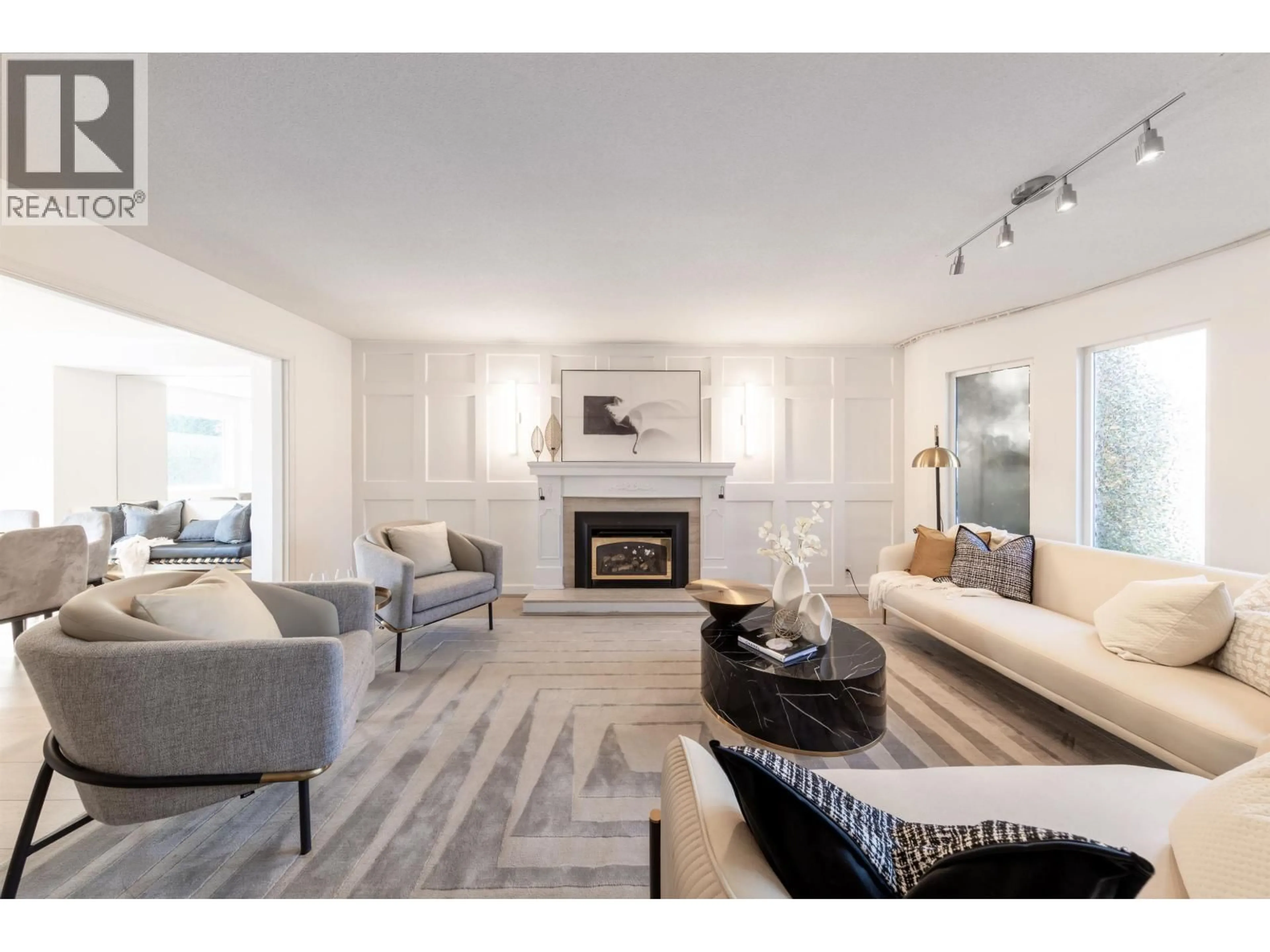 Living room with furniture, wood/laminate floor for 10535 LASSAM ROAD, Richmond British Columbia V7E2C2