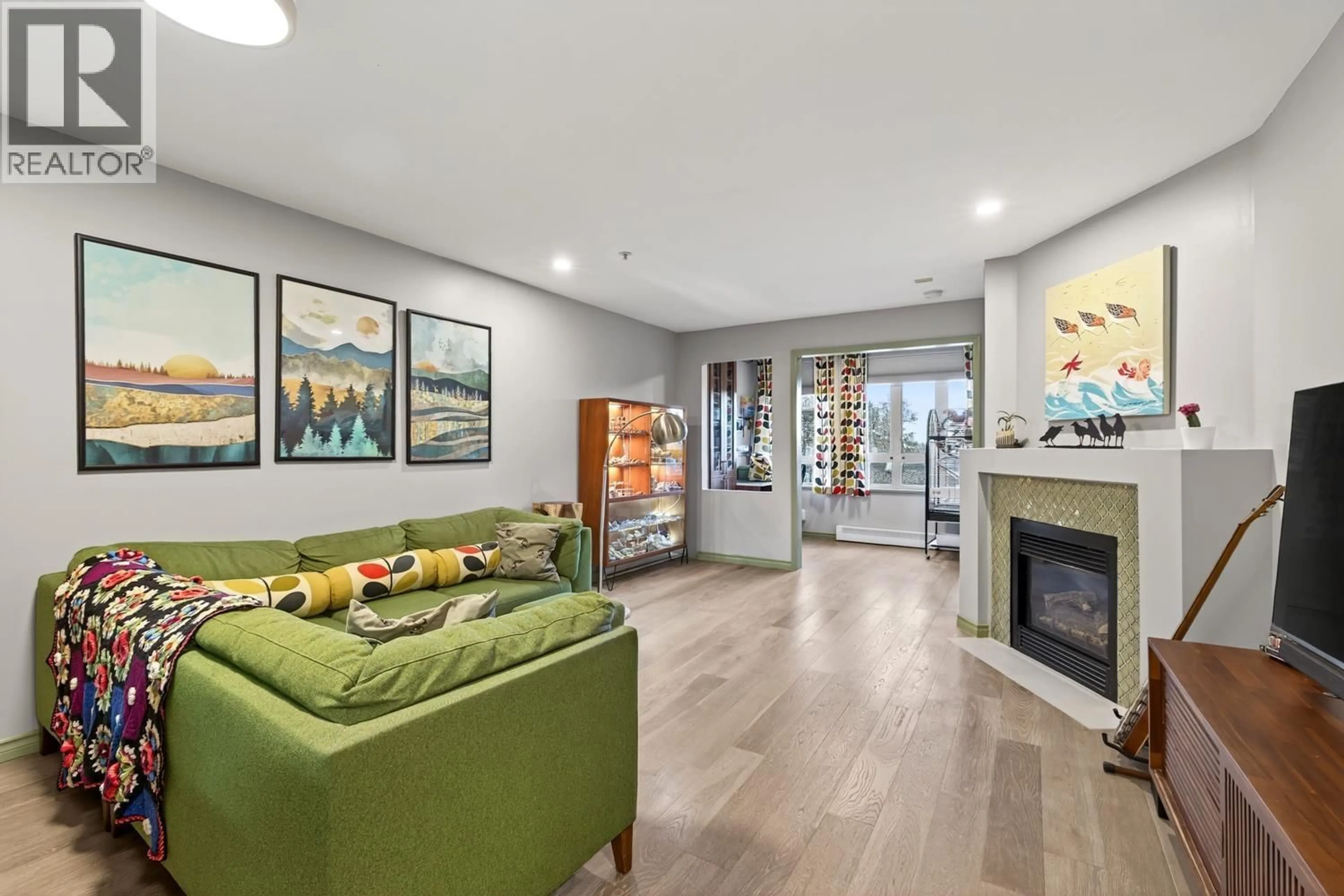 Living room with furniture, wood/laminate floor for 308 - 1688 4TH AVENUE, Vancouver British Columbia V5N1J8