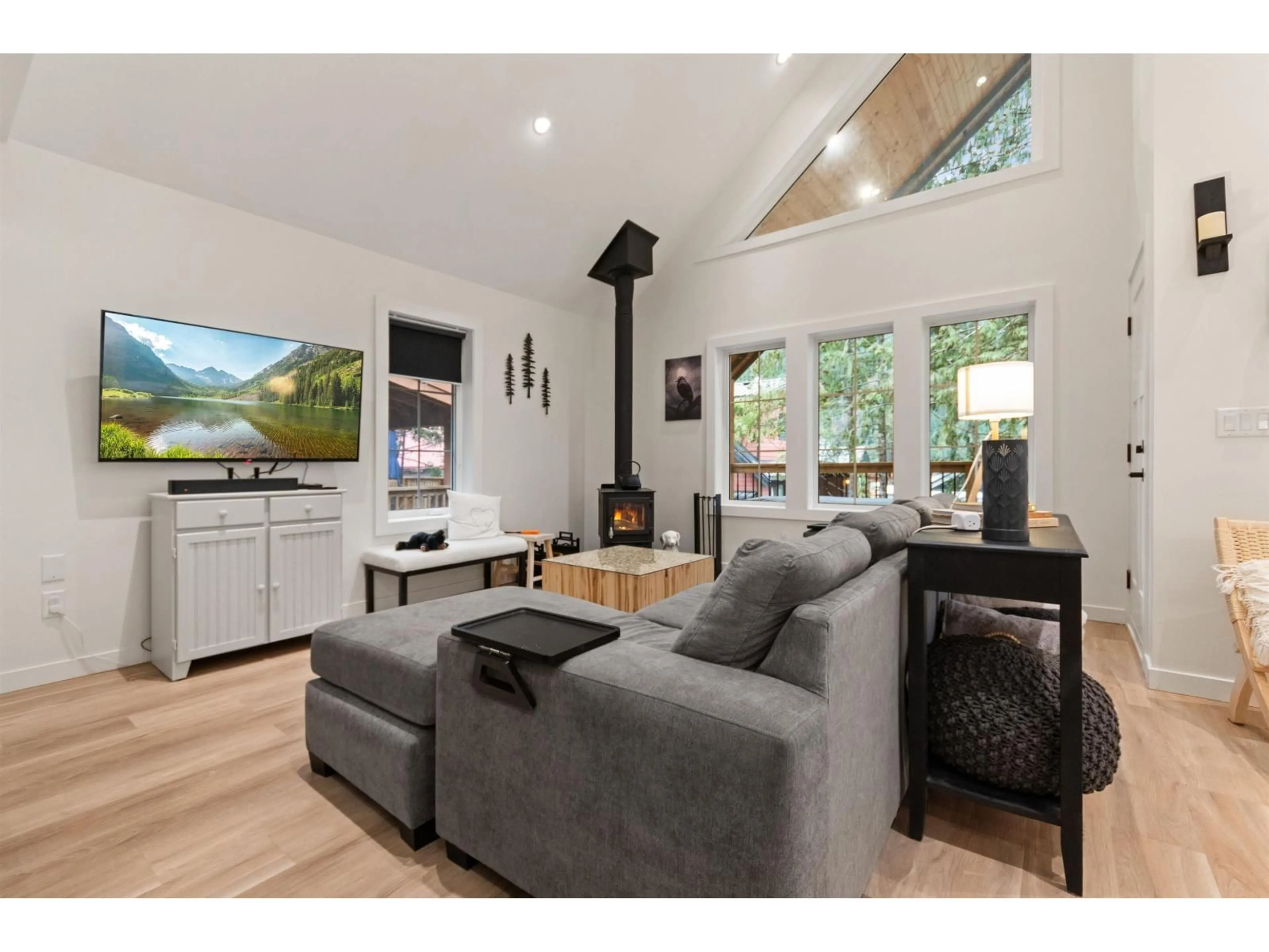Living room with furniture, wood/laminate floor for 71365 OLD HOPE PRINCETON HIGHWAY, Sunshine Valley British Columbia V0X1L5