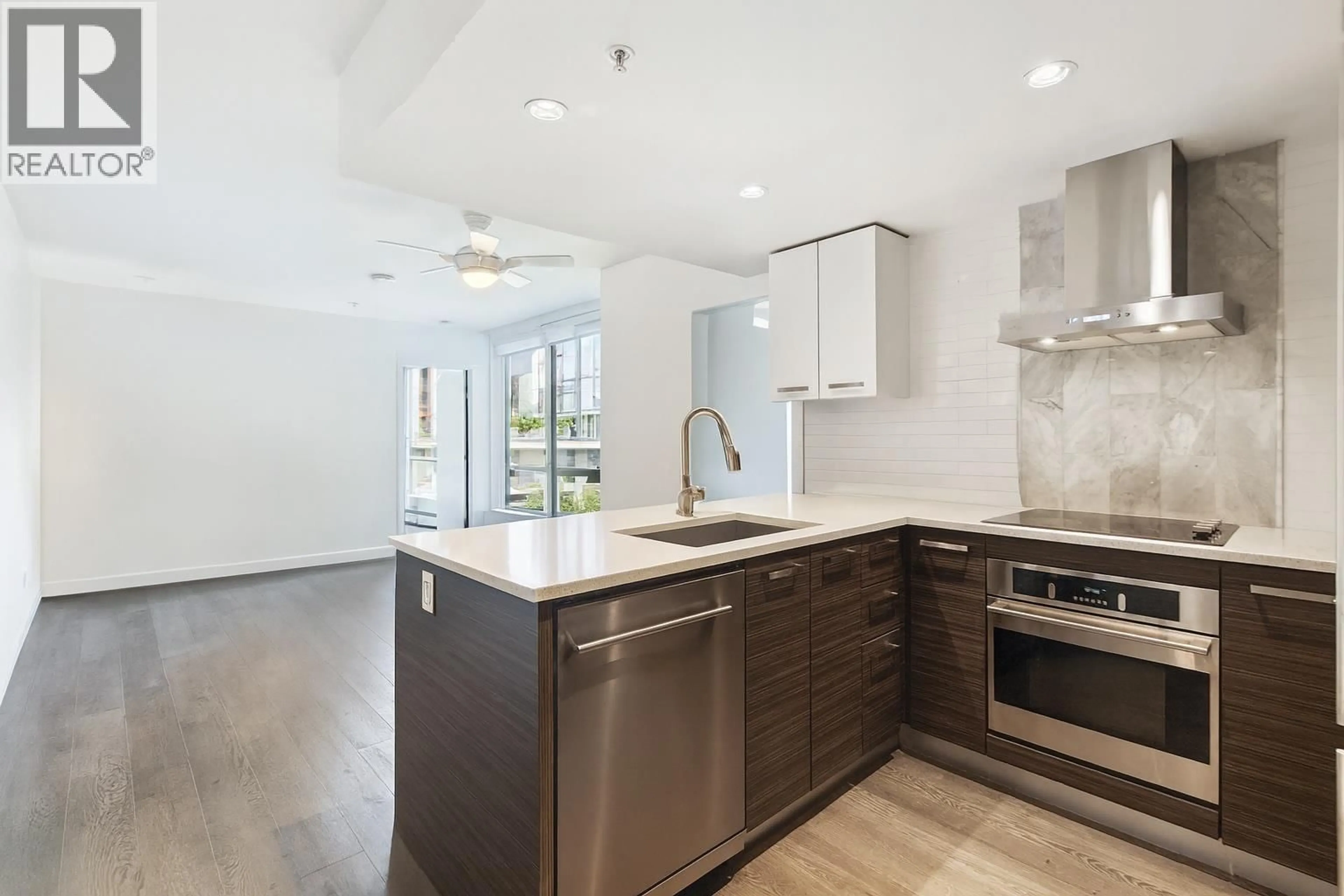 Open concept kitchen, unknown for 621 - 1783 MANITOBA STREET, Vancouver British Columbia V5Y0K1