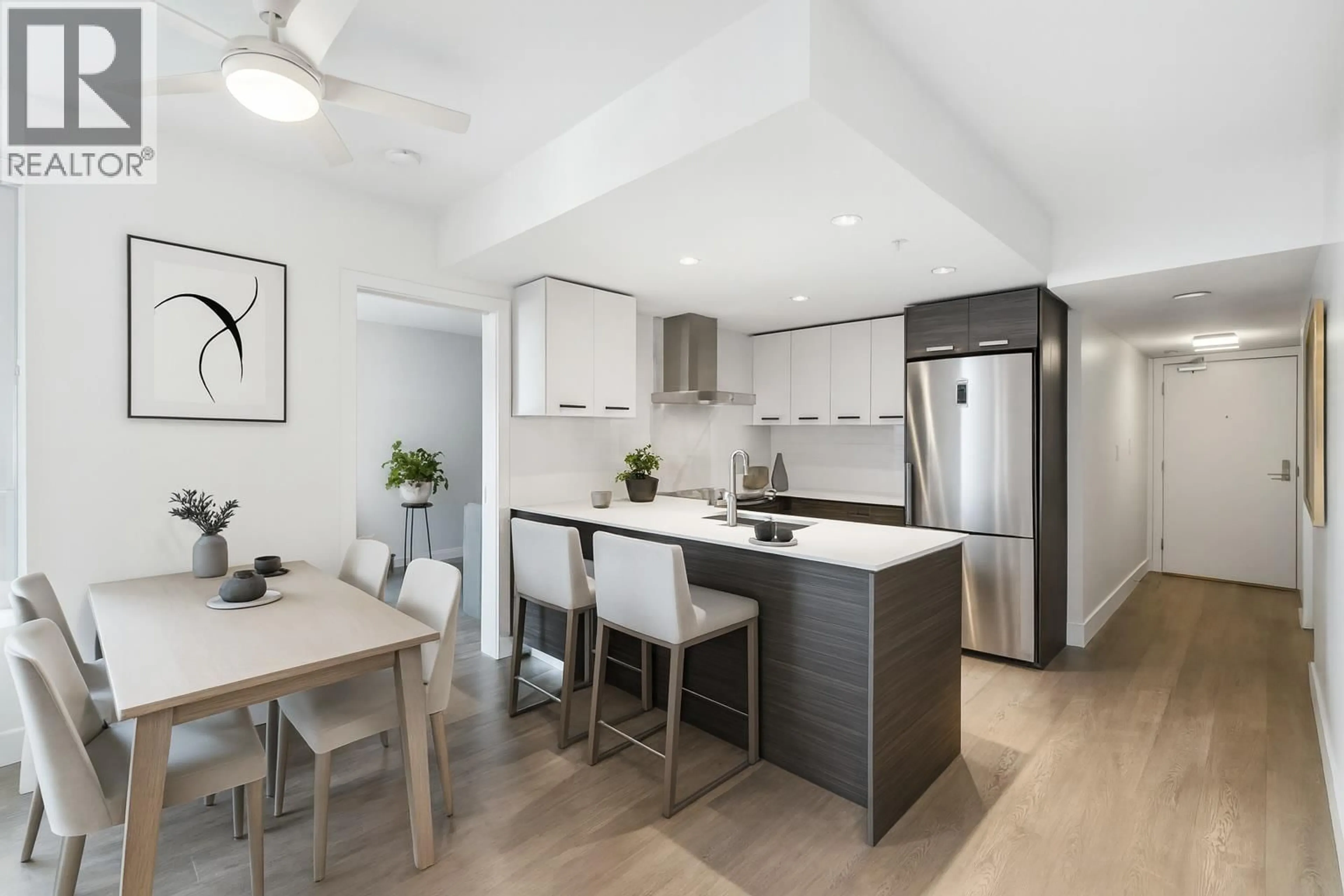 Open concept kitchen, wood/laminate floor for 621 - 1783 MANITOBA STREET, Vancouver British Columbia V5Y0K1