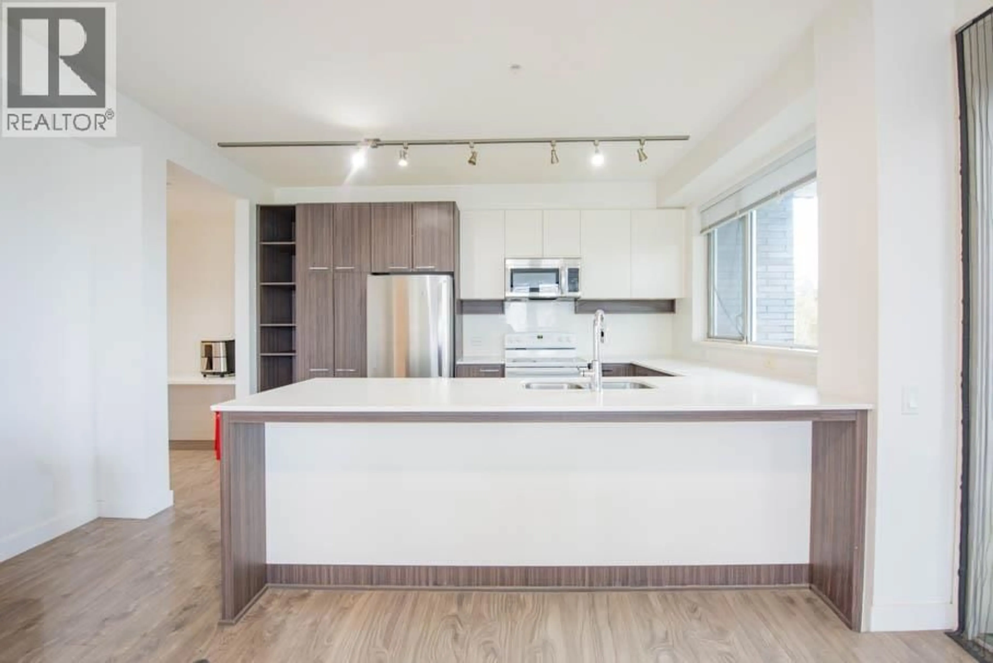 Open concept kitchen, unknown for 507 - 9250 UNIVERSITY HIGH STREET, Burnaby British Columbia V5A0B3