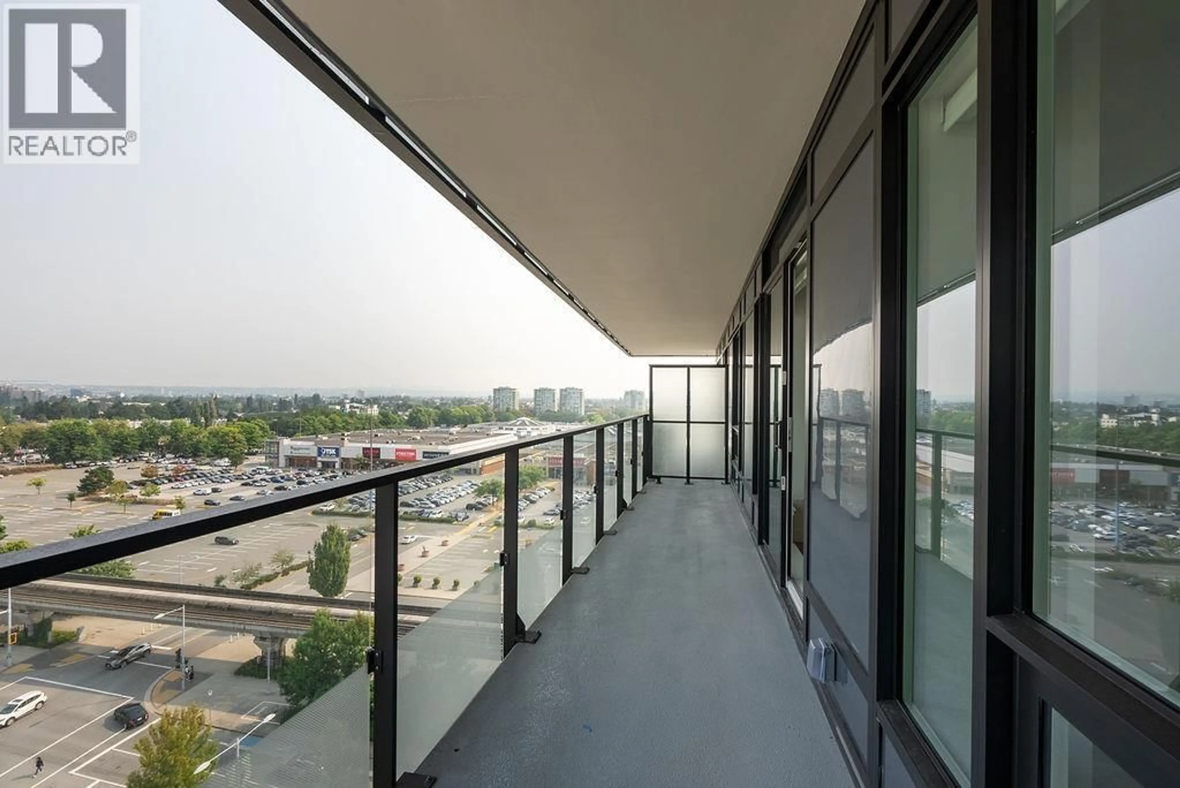 Balcony in the apartment, city buildings view from balcony for 1201 - 5593 NO. 3 ROAD, Richmond British Columbia V6X2A9