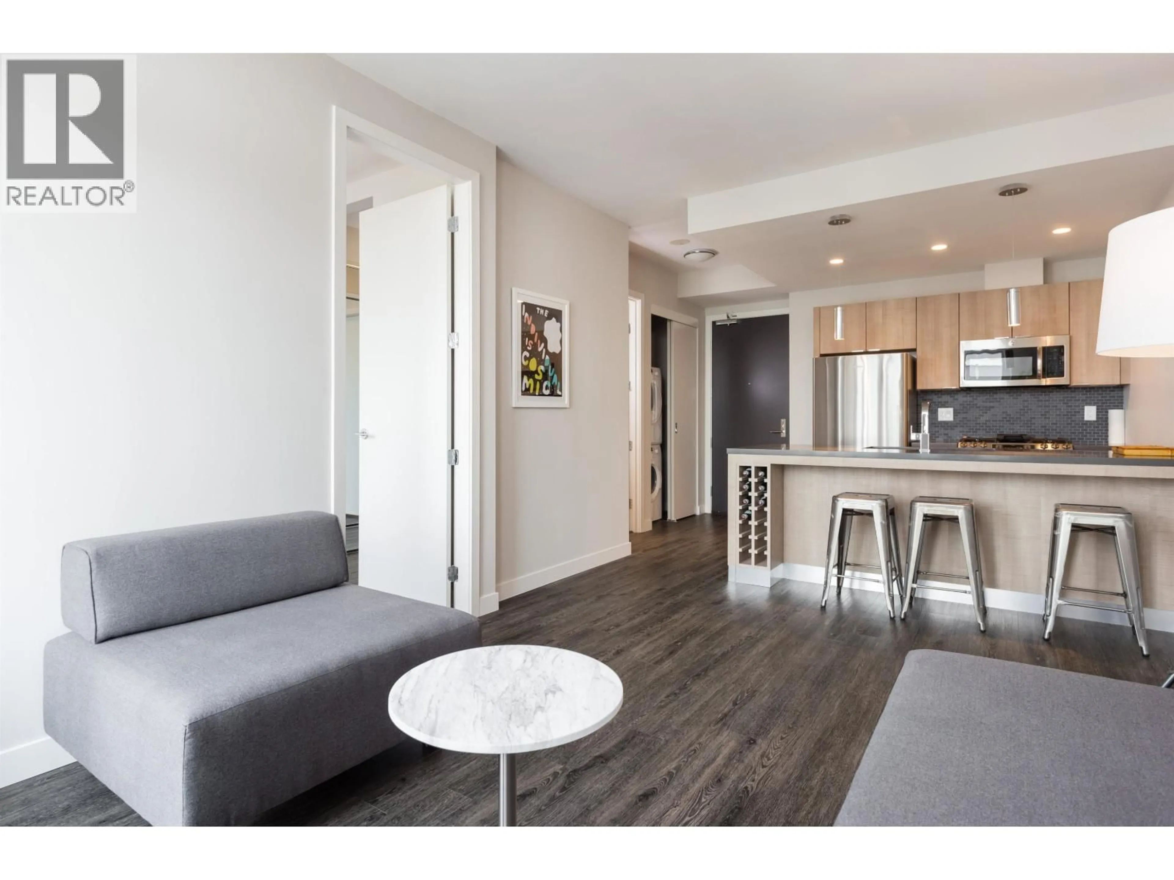 Living room with furniture, wood/laminate floor for 904 - 1788 ONTARIO STREET, Vancouver British Columbia V5T0E3