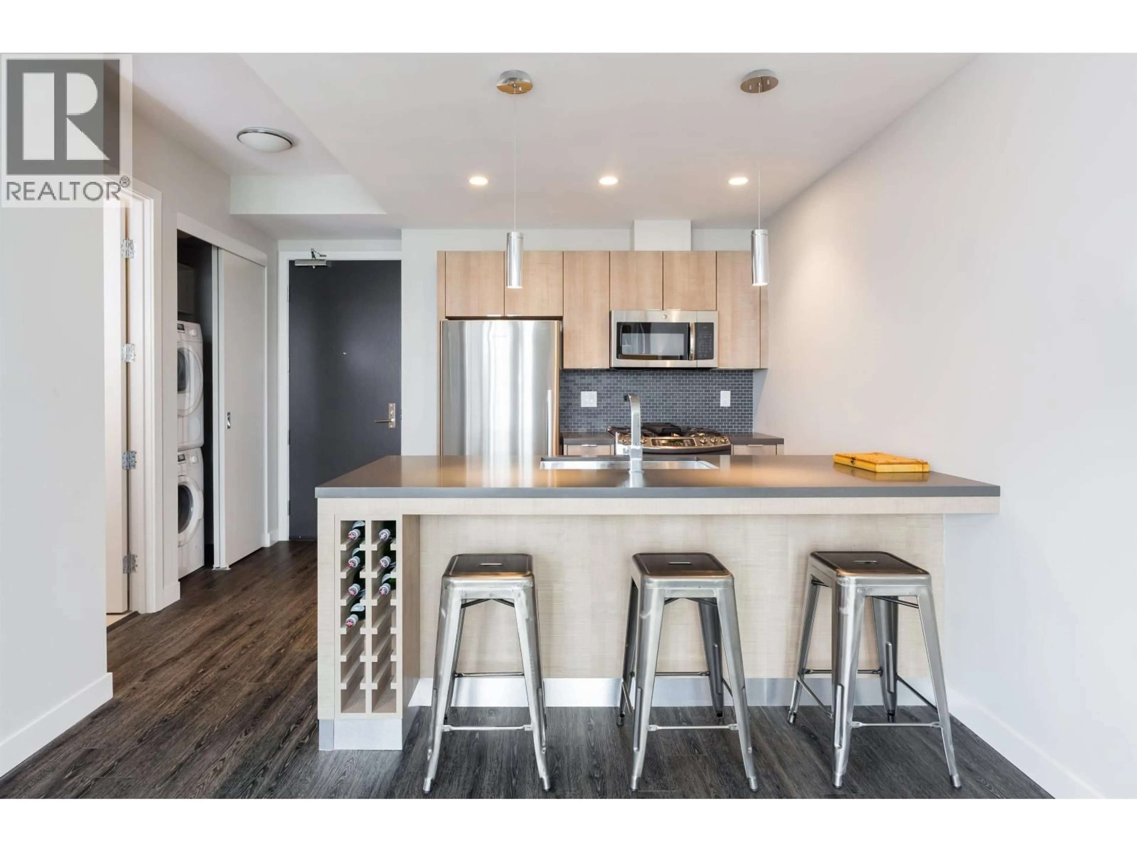 Open concept kitchen, wood/laminate floor for 904 - 1788 ONTARIO STREET, Vancouver British Columbia V5T0E3