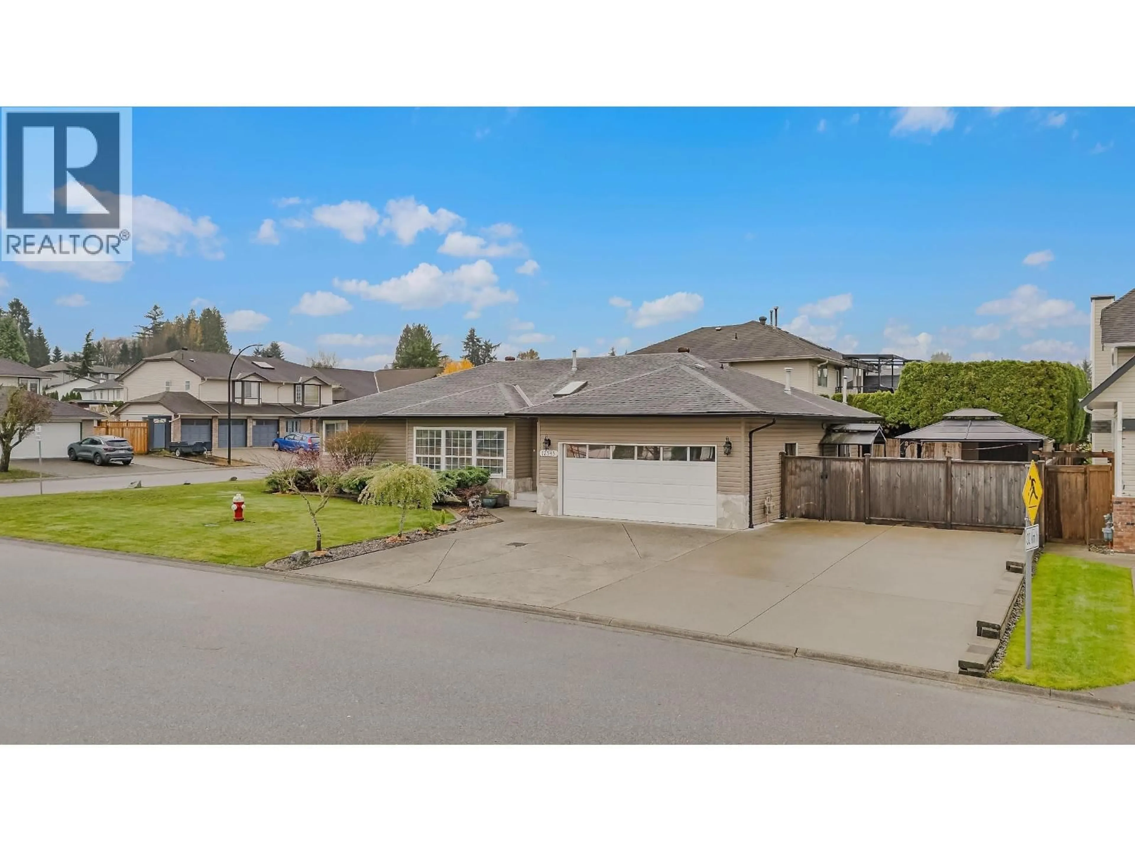 A pic from outside/outdoor area/front of a property/back of a property/a pic from drone, street for 12545 220A STREET, Maple Ridge British Columbia V2X0V6