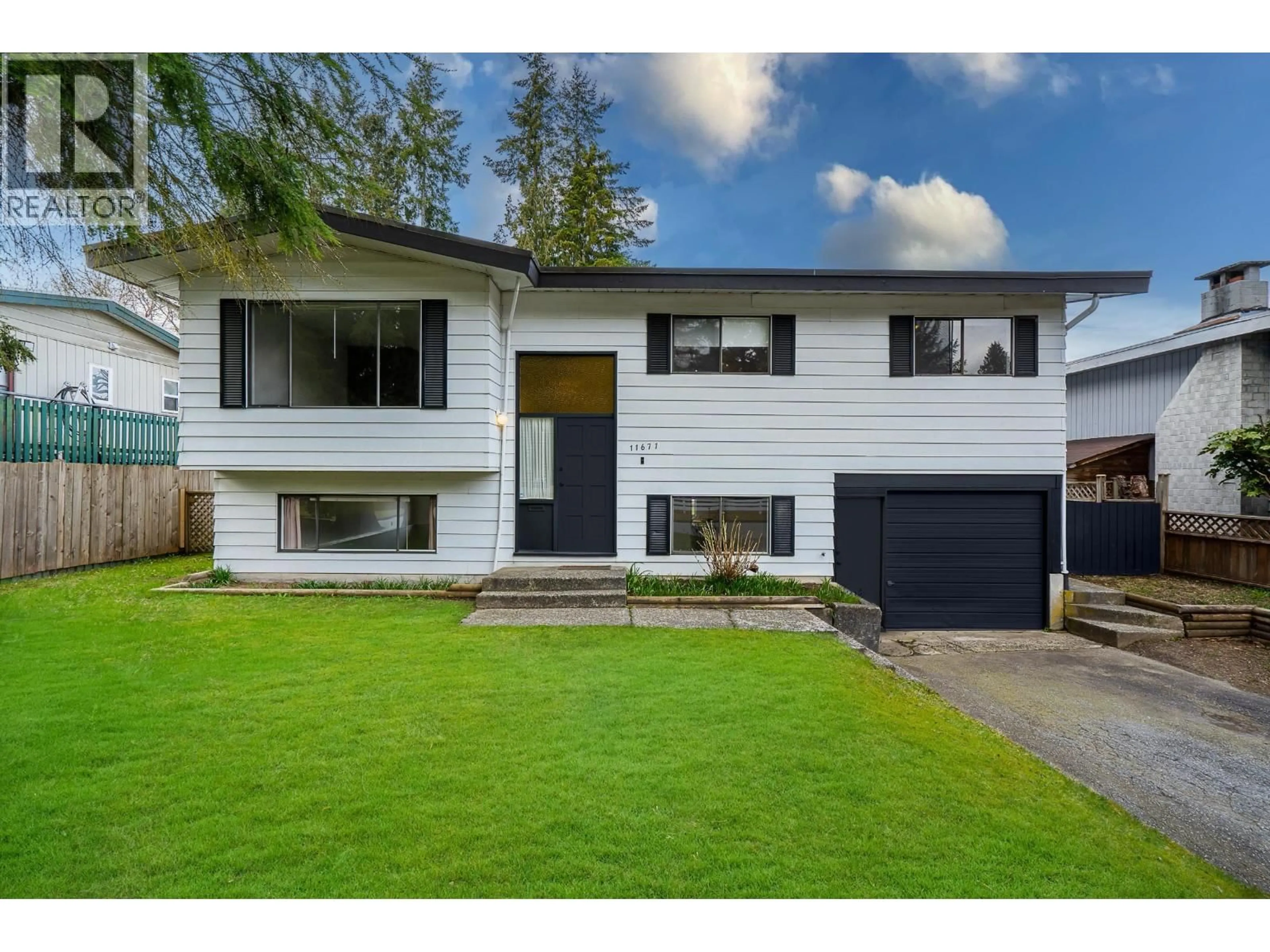 Home with vinyl exterior material, street for 11671 211 STREET, Maple Ridge British Columbia V2X7T5