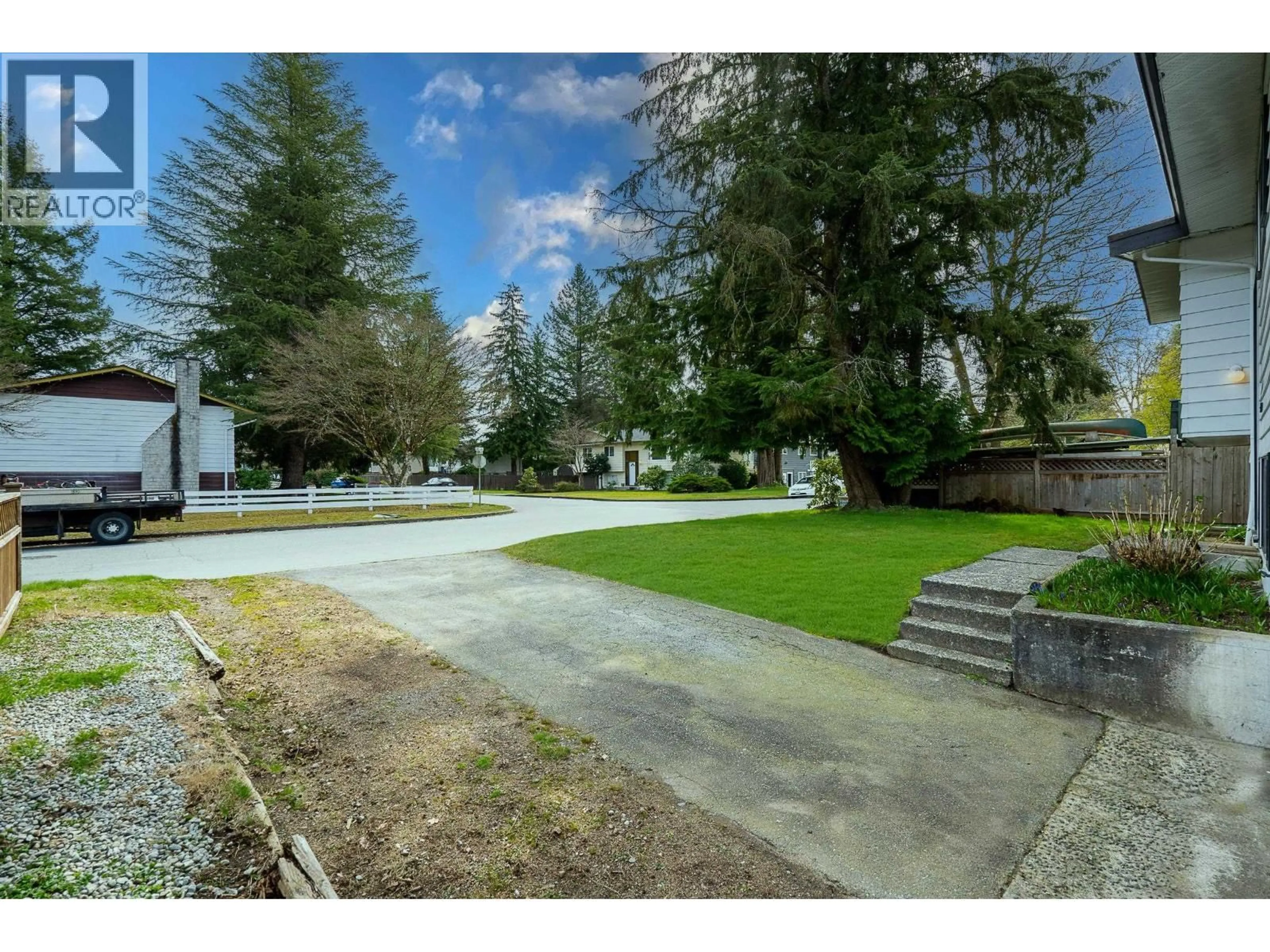 A pic from outside/outdoor area/front of a property/back of a property/a pic from drone, street for 11671 211 STREET, Maple Ridge British Columbia V2X7T5
