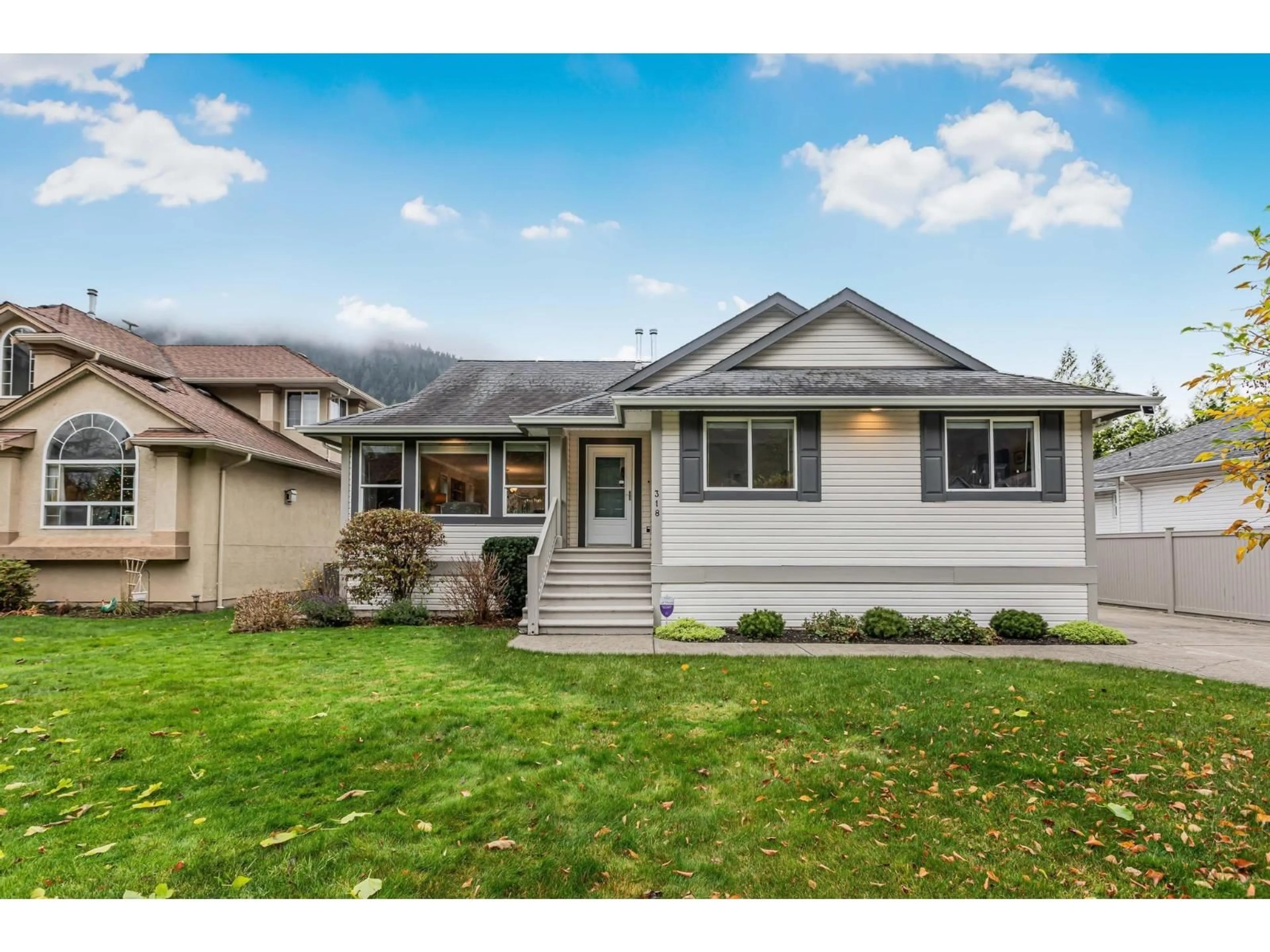 Home with vinyl exterior material, street for 318 MIAMI RIVER DRIVE, Harrison Hot Springs British Columbia V0M1K0