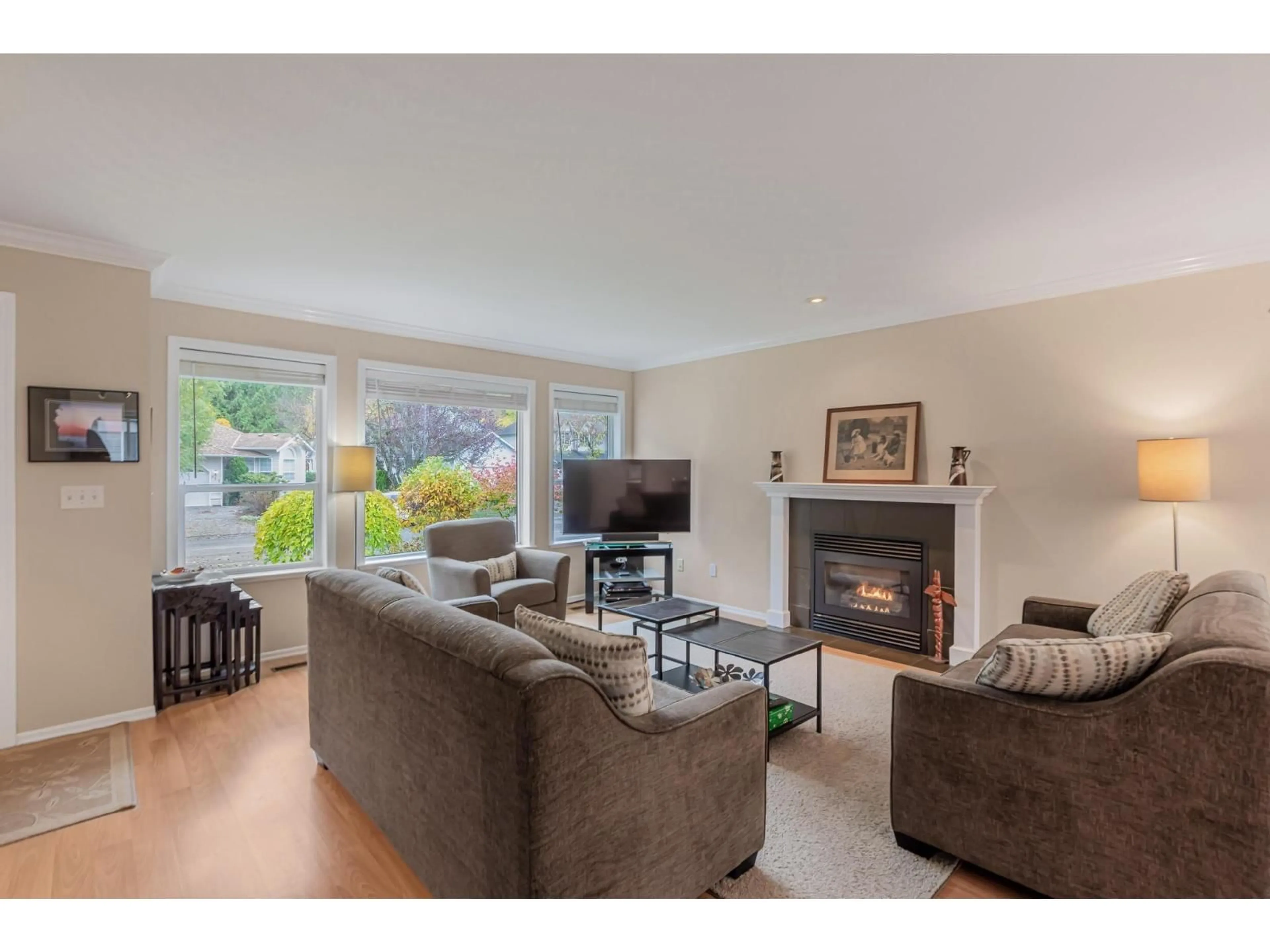 Living room with furniture, wood/laminate floor for 318 MIAMI RIVER DRIVE, Harrison Hot Springs British Columbia V0M1K0