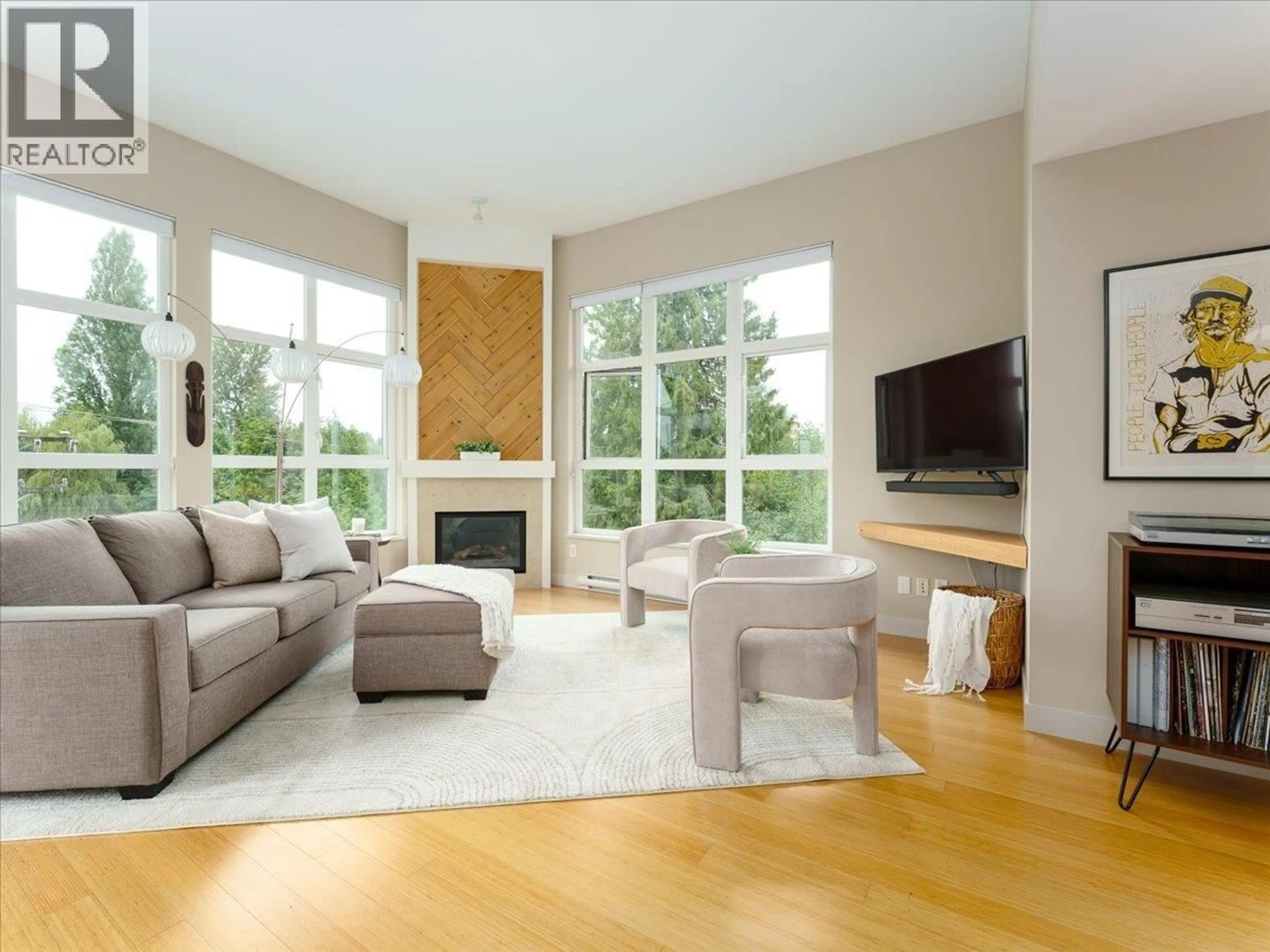 Living room with furniture, unknown for 402 - 3732 MT SEYMOUR PARKWAY, North Vancouver British Columbia V7G1C3
