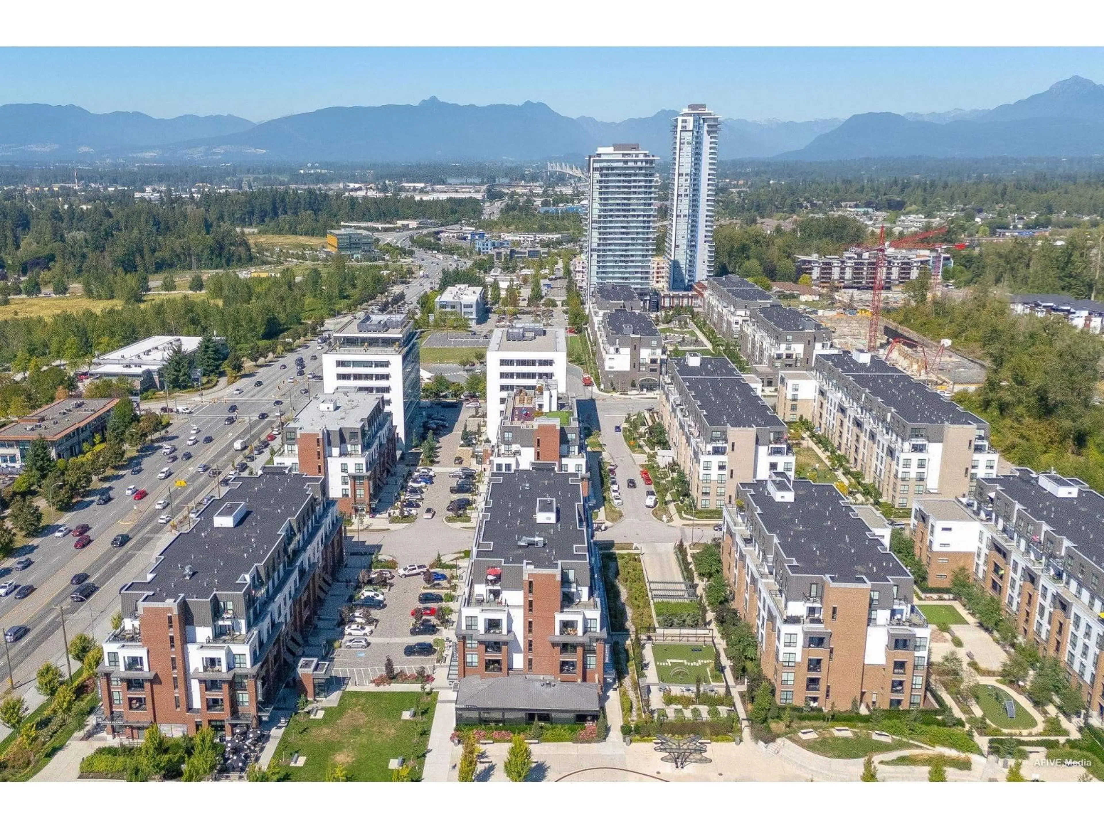 A pic from outside/outdoor area/front of a property/back of a property/a pic from drone, mountain view for B601 - 20018 83A AVENUE, Langley British Columbia V2Y3P3