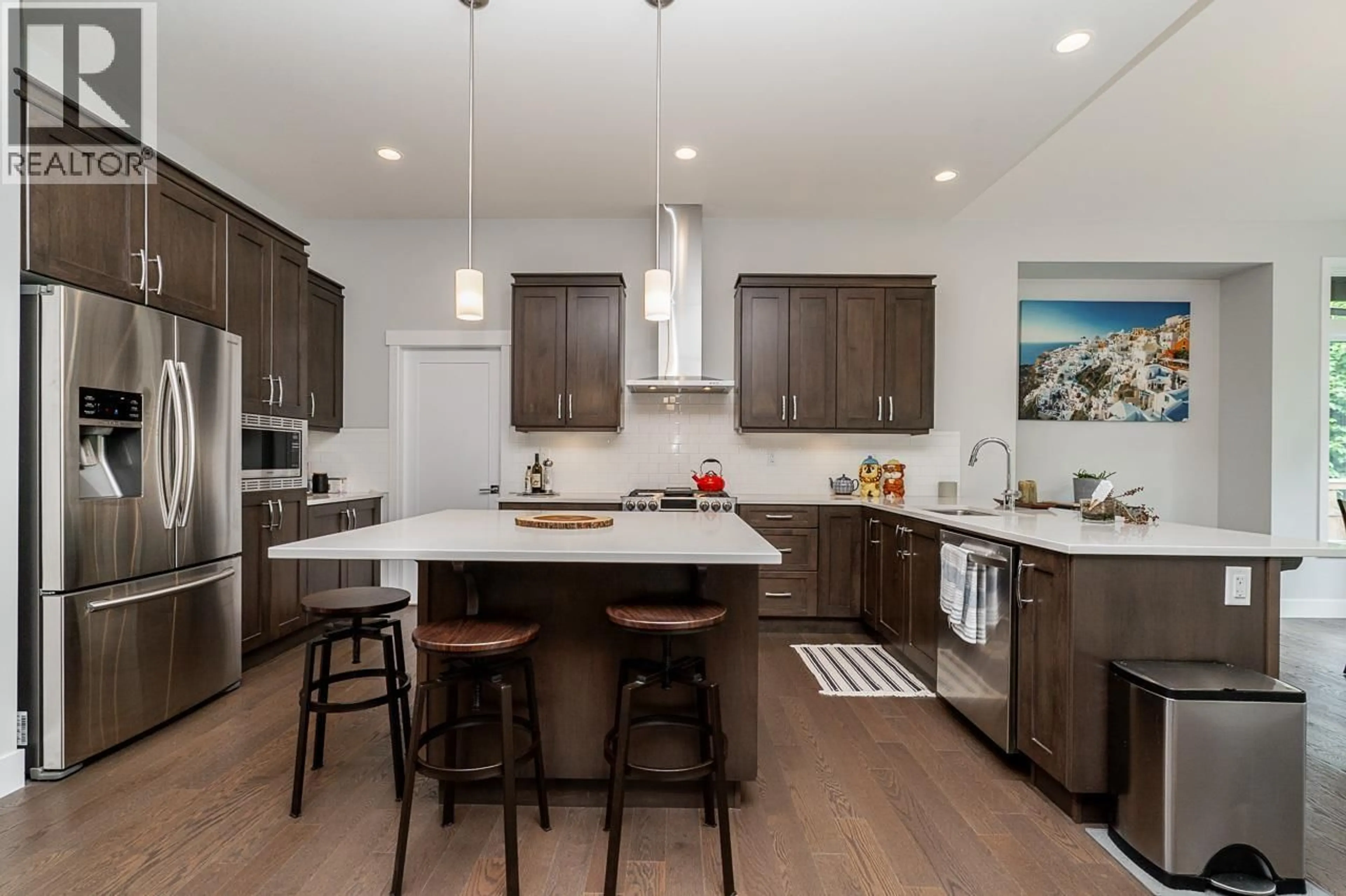 Open concept kitchen, wood/laminate floor for 3511 BISHOP PLACE, Coquitlam British Columbia V3E0K2