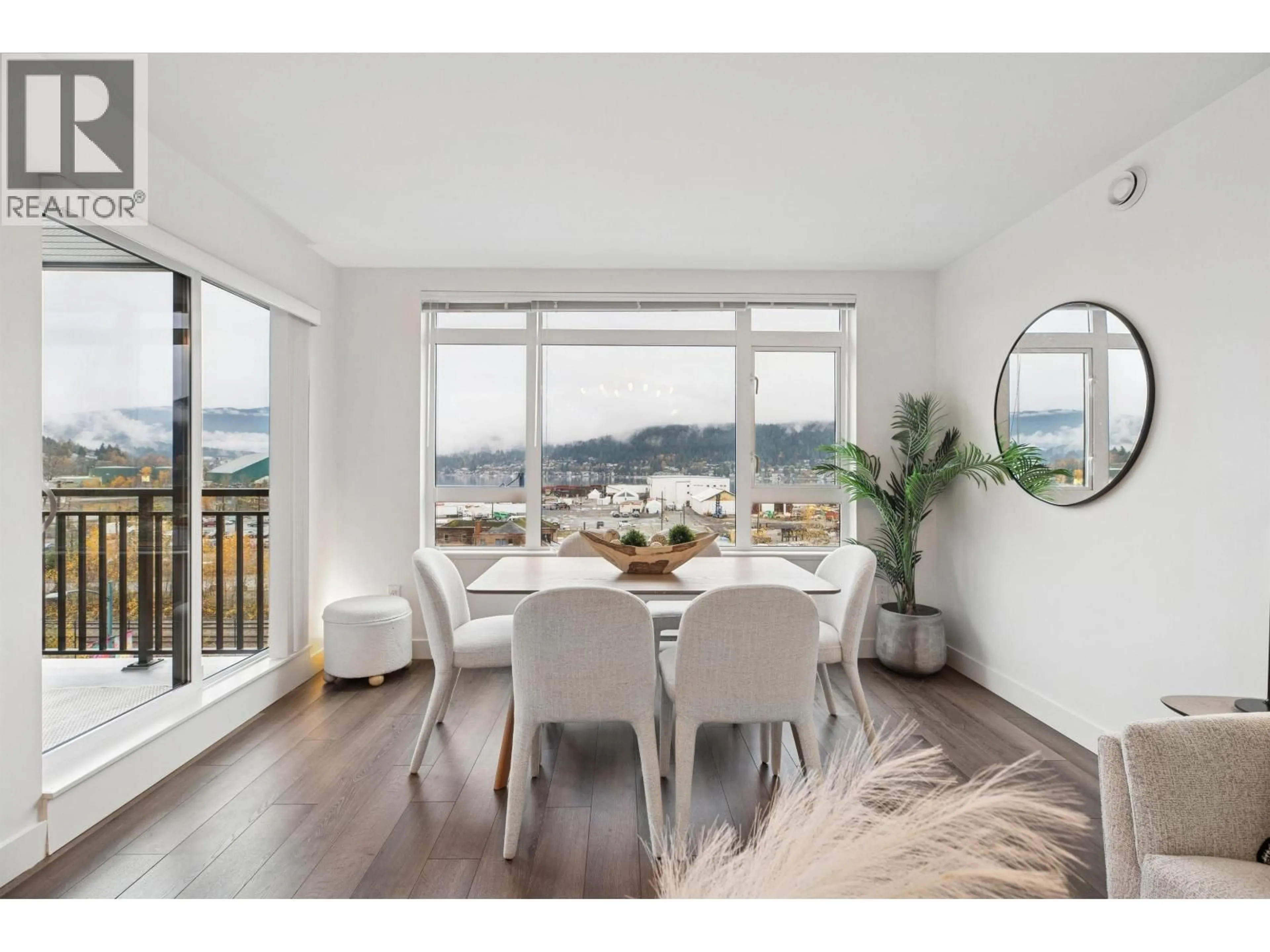Dining room, wood/laminate floor for 412 - 2525 CLARKE STREET, Port Moody British Columbia V3H0J3