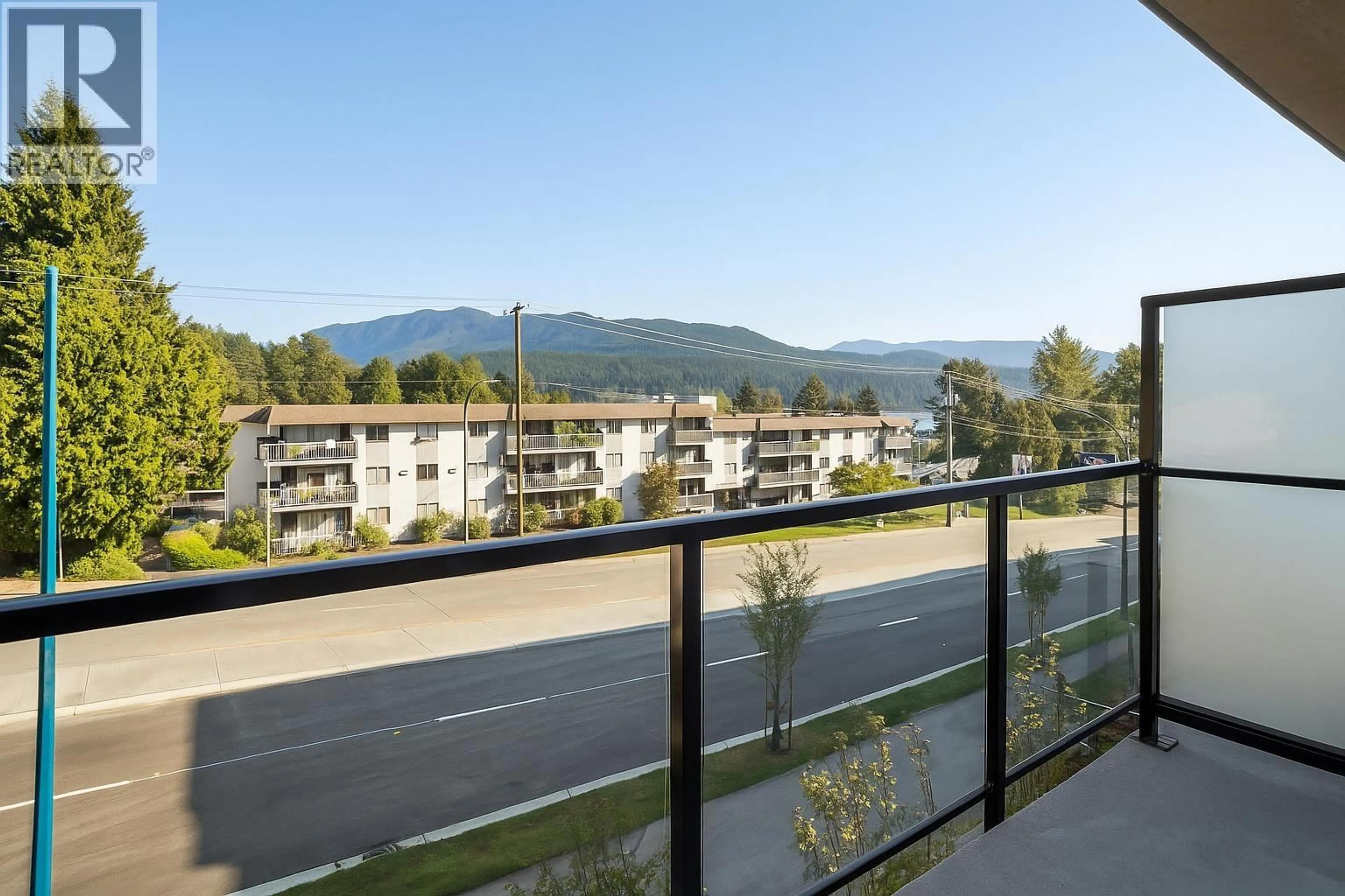 Balcony in the apartment, mountain view for 105 - 1100 CLARKE ROAD, Port Moody British Columbia V6M4B9