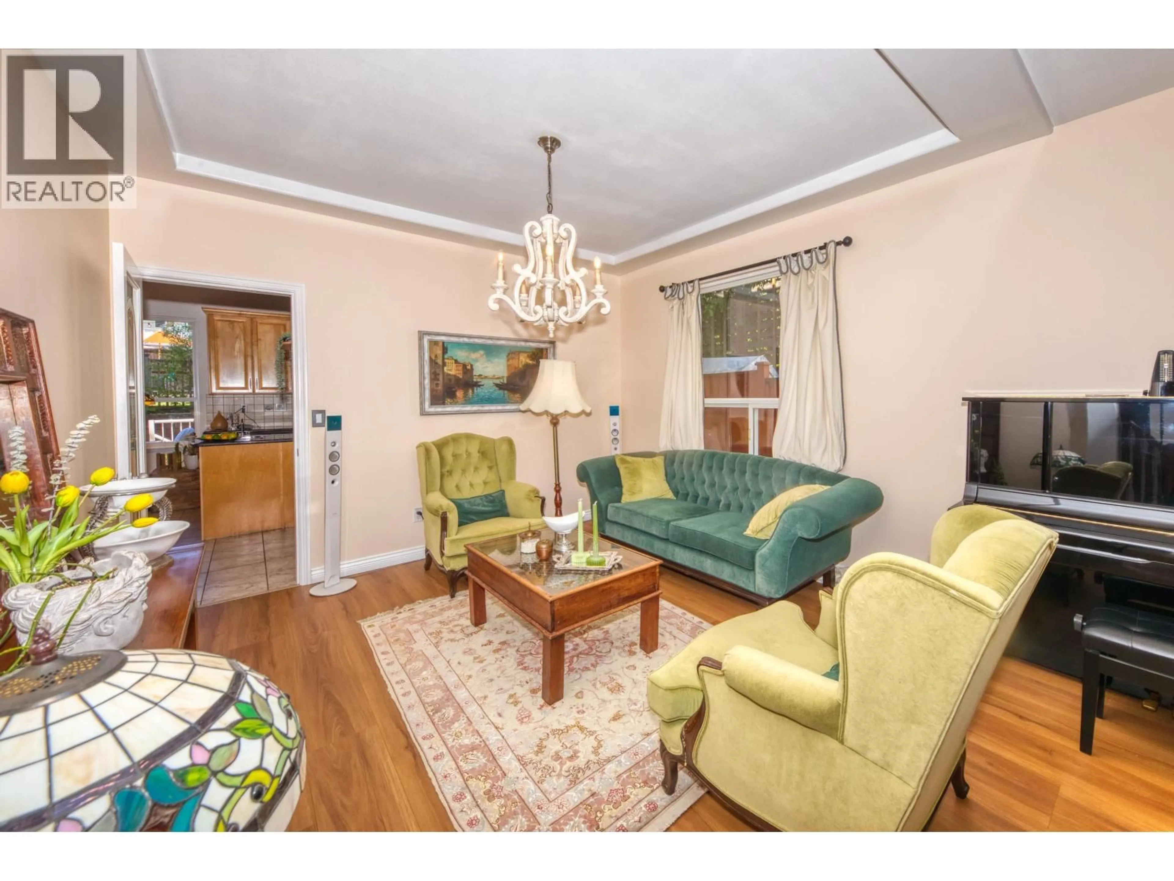 Living room with furniture, wood/laminate floor for 826 13TH STREET, North Vancouver British Columbia V7L2M9